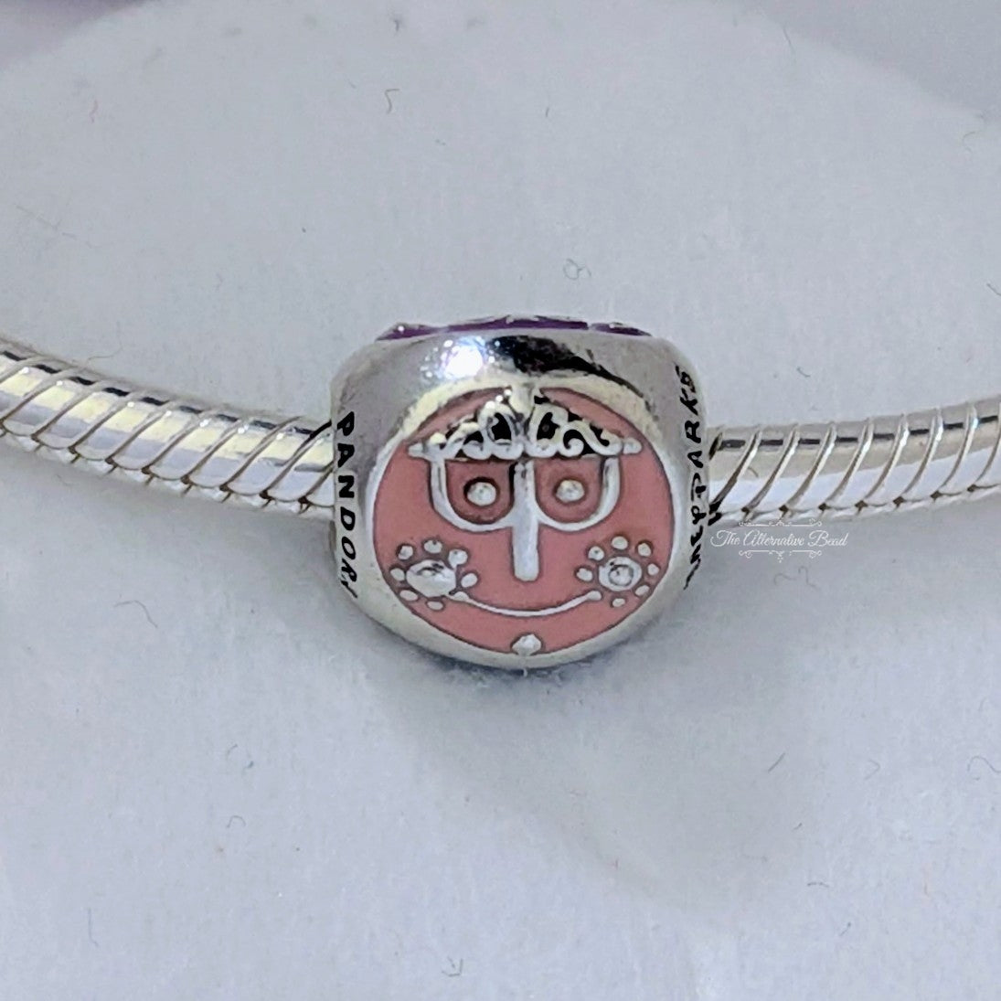 Disney x Pandora It's a Small World Charm retired silver and pink and purple and blue sterling-silver and enamel Bead by The Alternative Bead. Your Jewelry Retailer from Germany