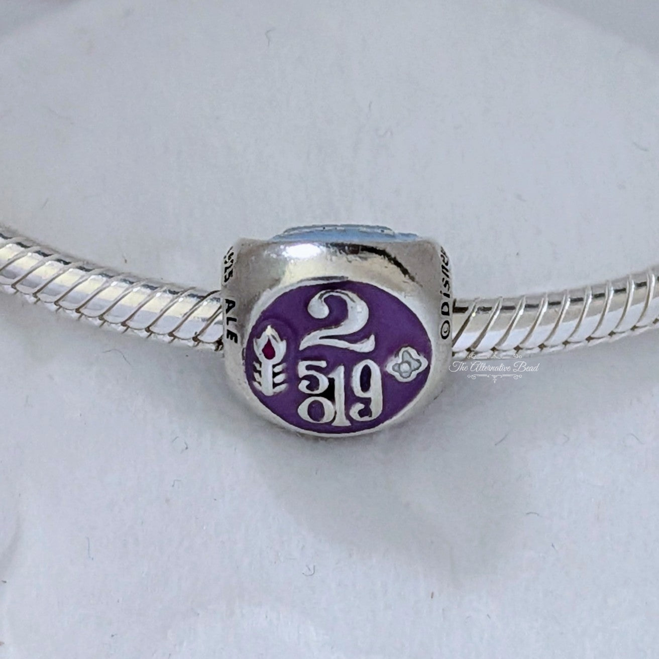 Disney x Pandora It's a Small World Charm retired silver and pink and purple and blue sterling-silver and enamel Bead by The Alternative Bead. Your Jewelry Retailer from Germany