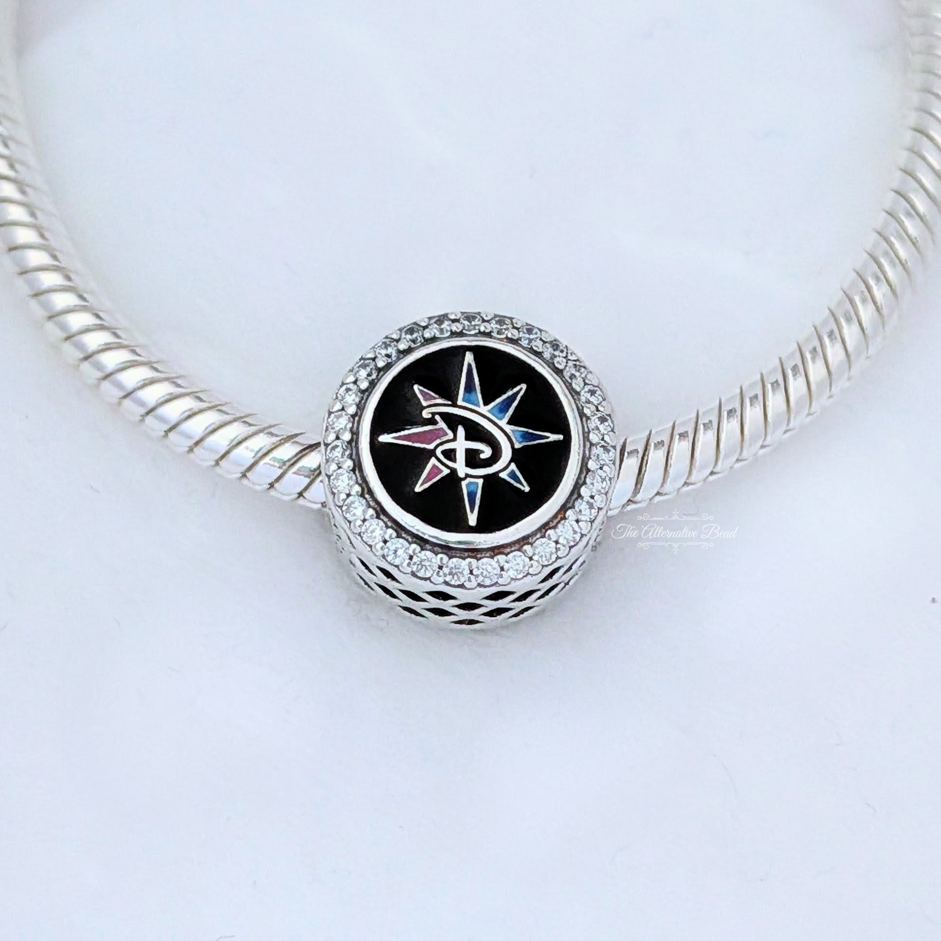 Disney x Pandora Disney Adventure World Logo Button Charm silver; purple; blue sterling-silver; enamel Bead by The Alternative Bead. Your Jewelry Retailer from Germany