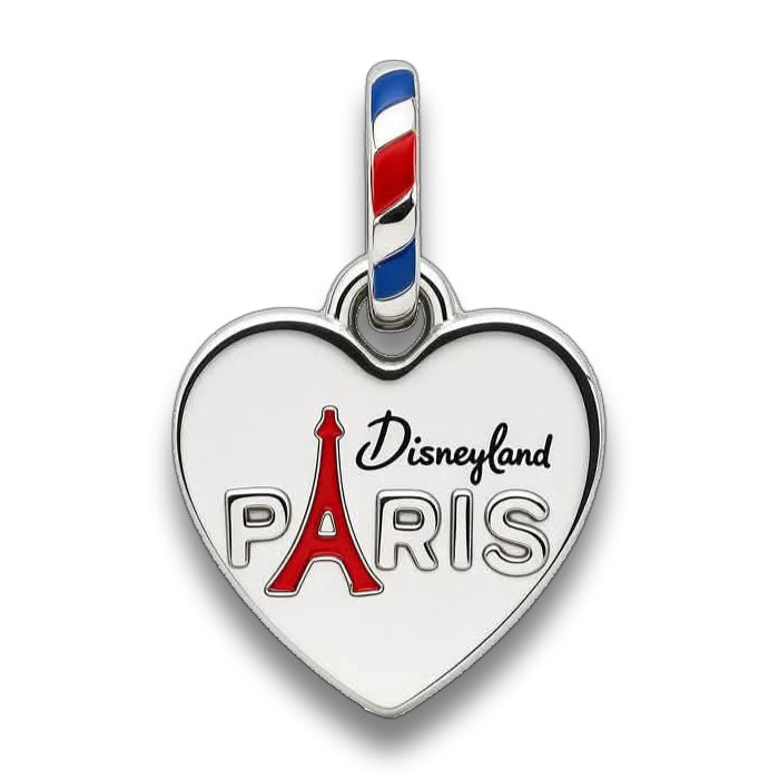 A heart-shaped silver charm featuring the text 'Disneyland PARIS' with a red Eiffel Tower graphic, and a striped bail with red, white, and blue enamel.