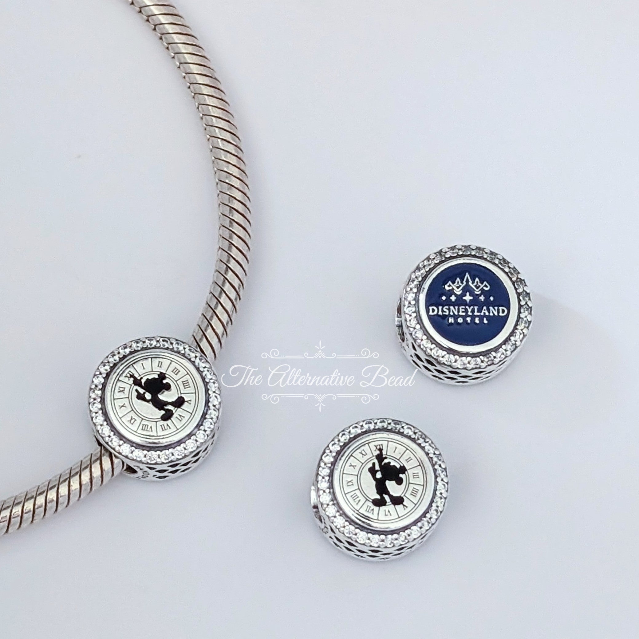 Disney x Pandora Disneyland Hotel Paris Guest Exclusive Charm silver and blue and black sterling-silver and enamel Bead by The Alternative Bead. Your official Disney x Pandora Retailer from Germany
