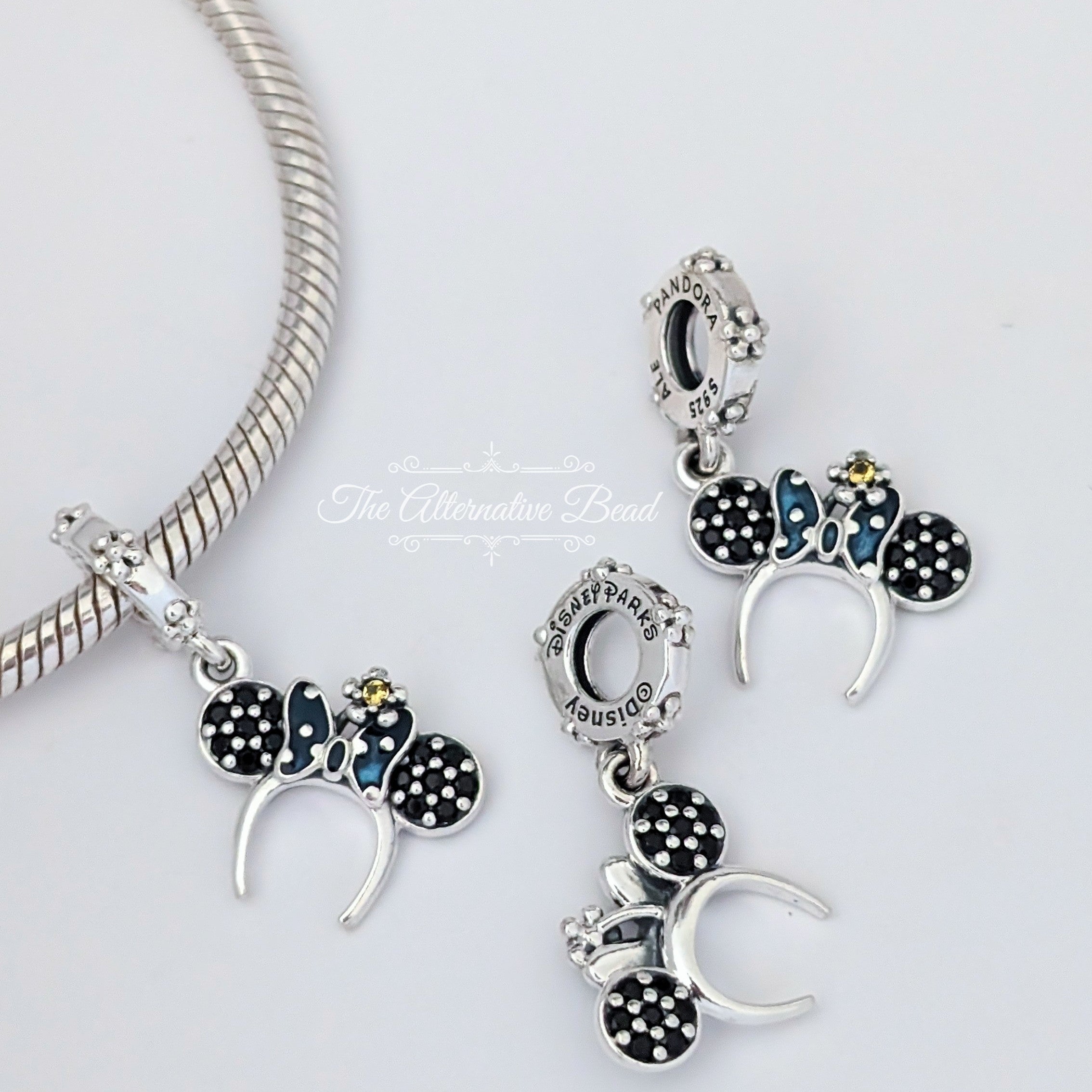 Disney x Pandora Minnie Mouse Ear Headband Dangle silver and blue and black sterling-silver Dangle by The Alternative Bead. Your official Disney x Pandora Retailer from Germany