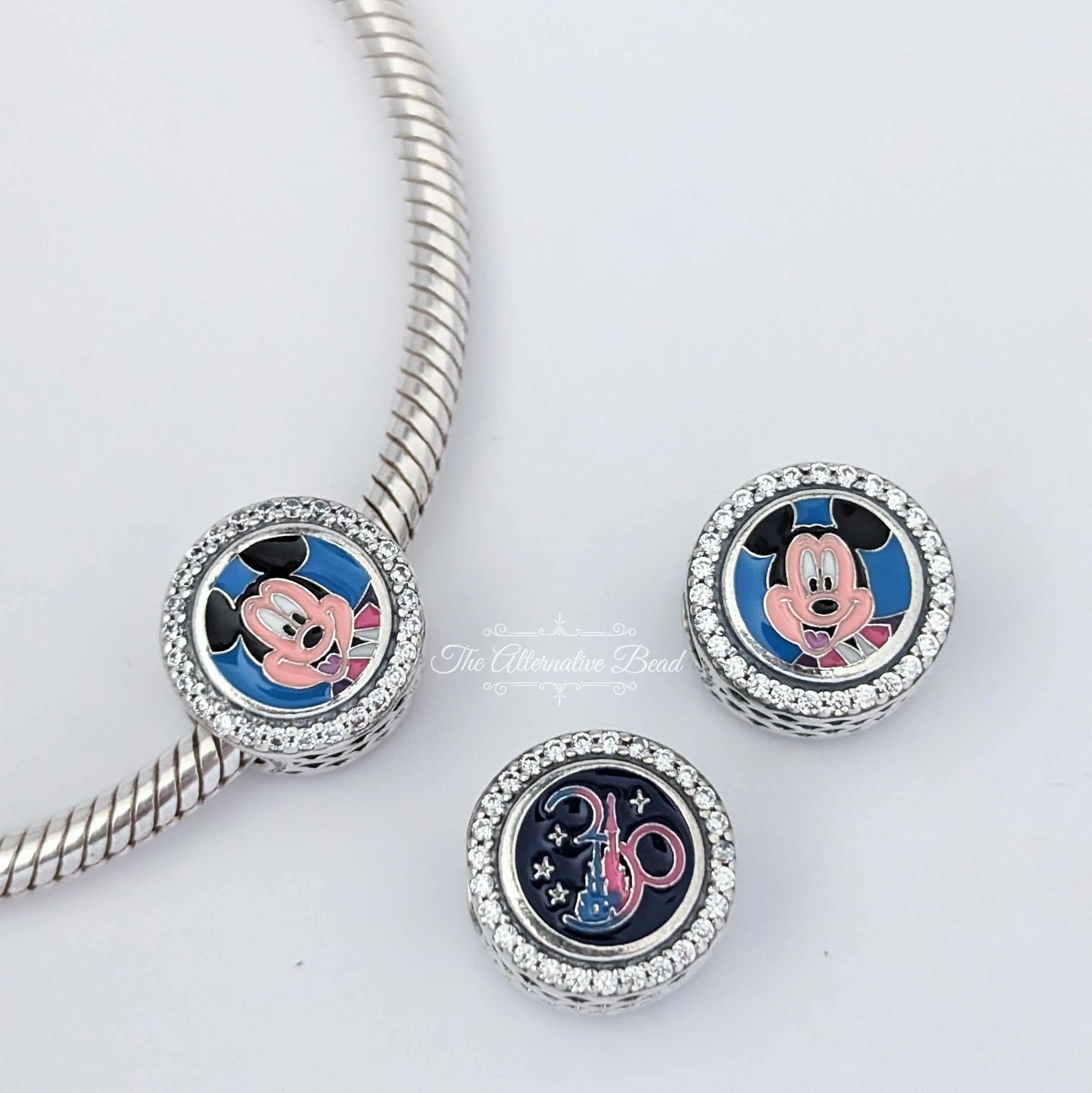 Disney x Pandora Disneyland Paris 30th Anniversary Mickey Mouse silver and blue sterling-silver Bead by The Alternative Bead. Your official Disney x Pandora Retailer from Germany