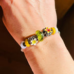 Aurora Charm Dew of the Deep Woods Murano Glass Bead green; yellow; black glass Bead by The Alternative Bead. Your official Aurora Charm Retailer from Germany