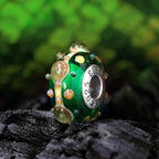 Elfbeads Dragon Eyes Rebirth green glass Bead by The Alternative Bead. Your official Elfbeads Retailer from Germany