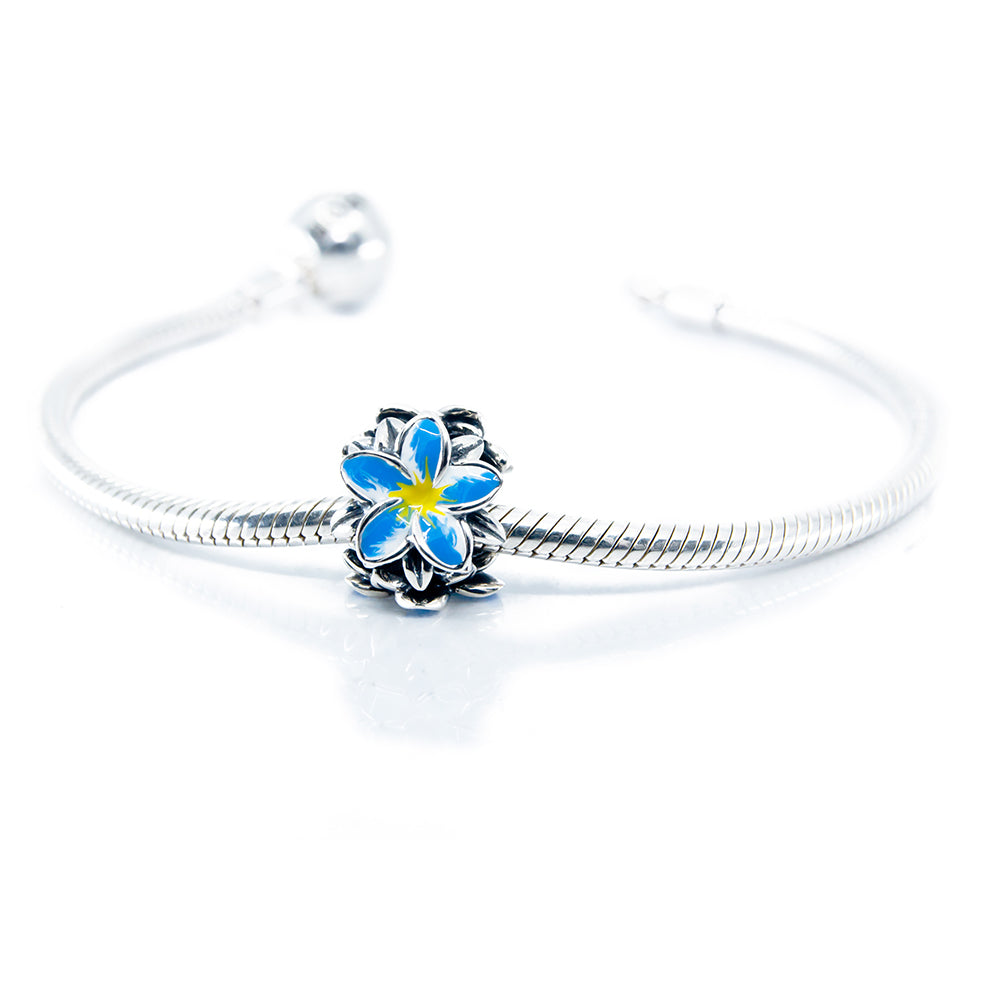Aurora Charm Frangipani Blue Yellow Flower Charm silver; yellow; blue sterling-silver; enamel Bead by The Alternative Bead. Your official Aurora Charm Retailer from Germany