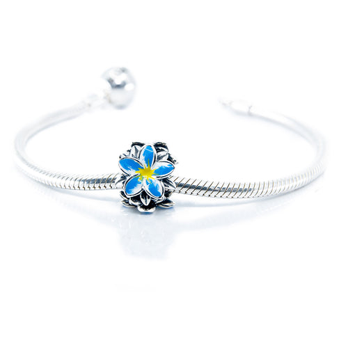 Aurora Charm Frangipani Blue Yellow Flower Charm silver; yellow; blue sterling-silver; enamel Bead by The Alternative Bead. Your official Aurora Charm Retailer from Germany