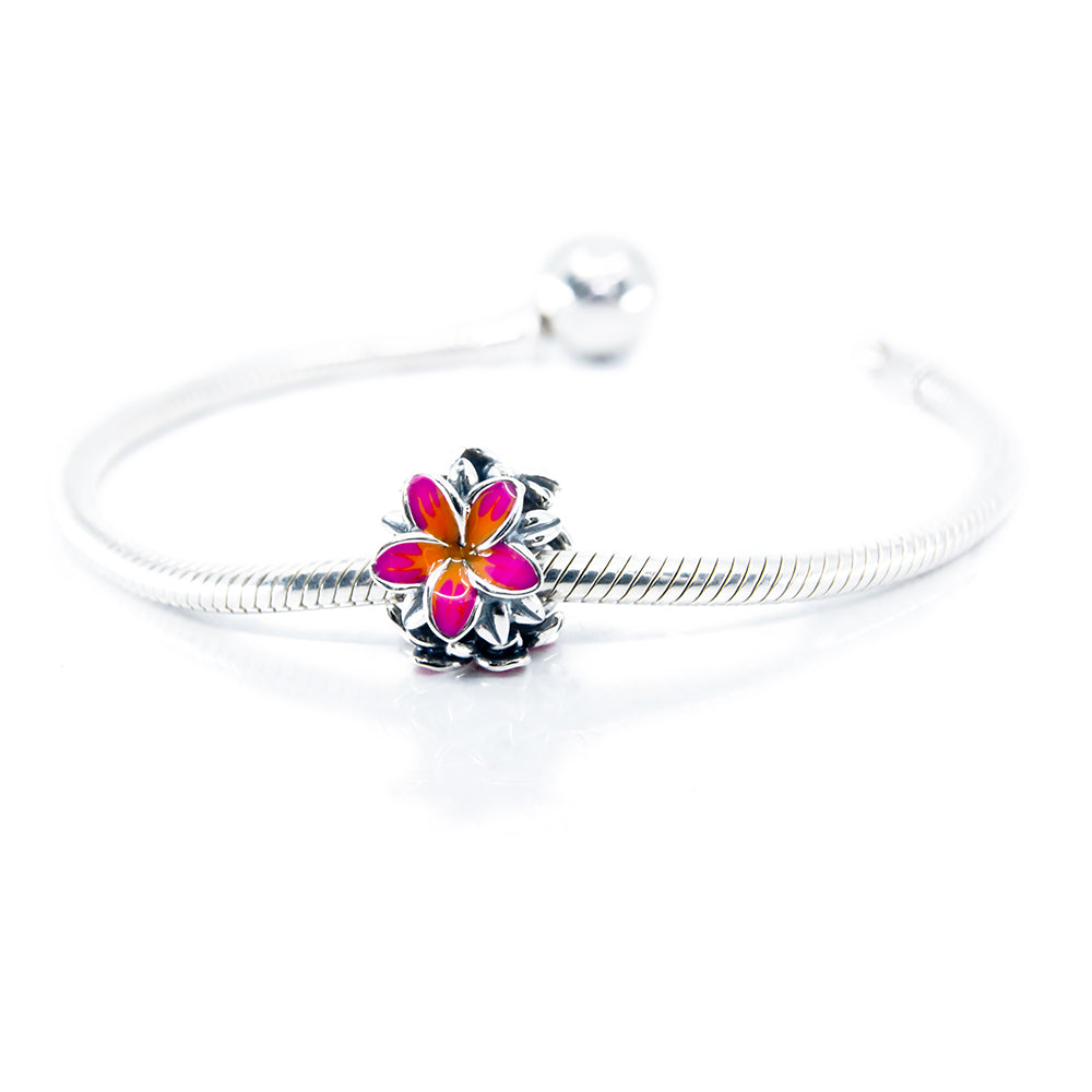 Aurora Charm Frangipani Orange Fuchsia Flower Charm silver; orange; pink sterling-silver; enamel Bead by The Alternative Bead. Your official Aurora Charm Retailer from Germany