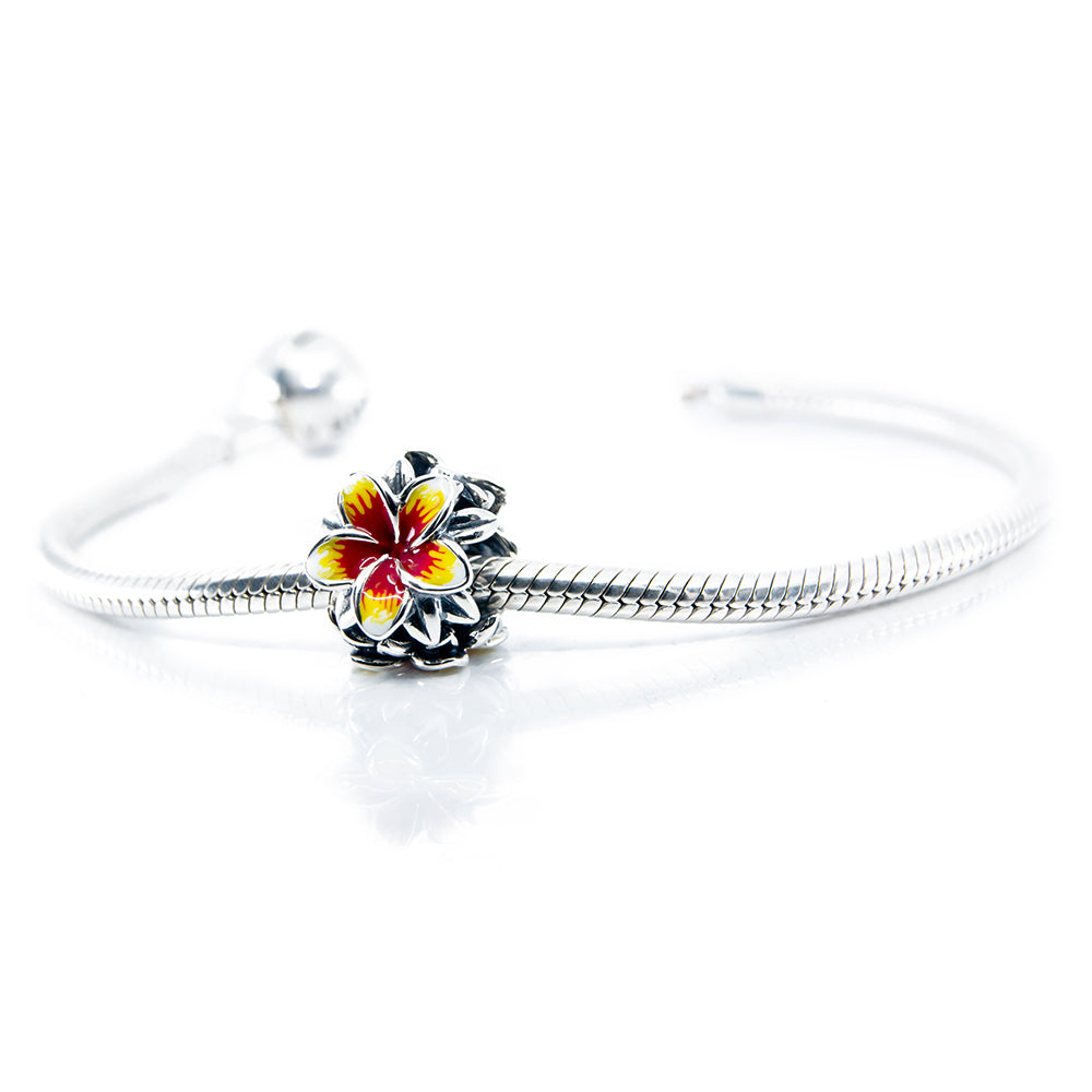Aurora Charm Frangipani Red Yellow Flower Charm silver; red; yellow sterling-silver; enamel Bead by The Alternative Bead. Your official Aurora Charm Retailer from Germany
