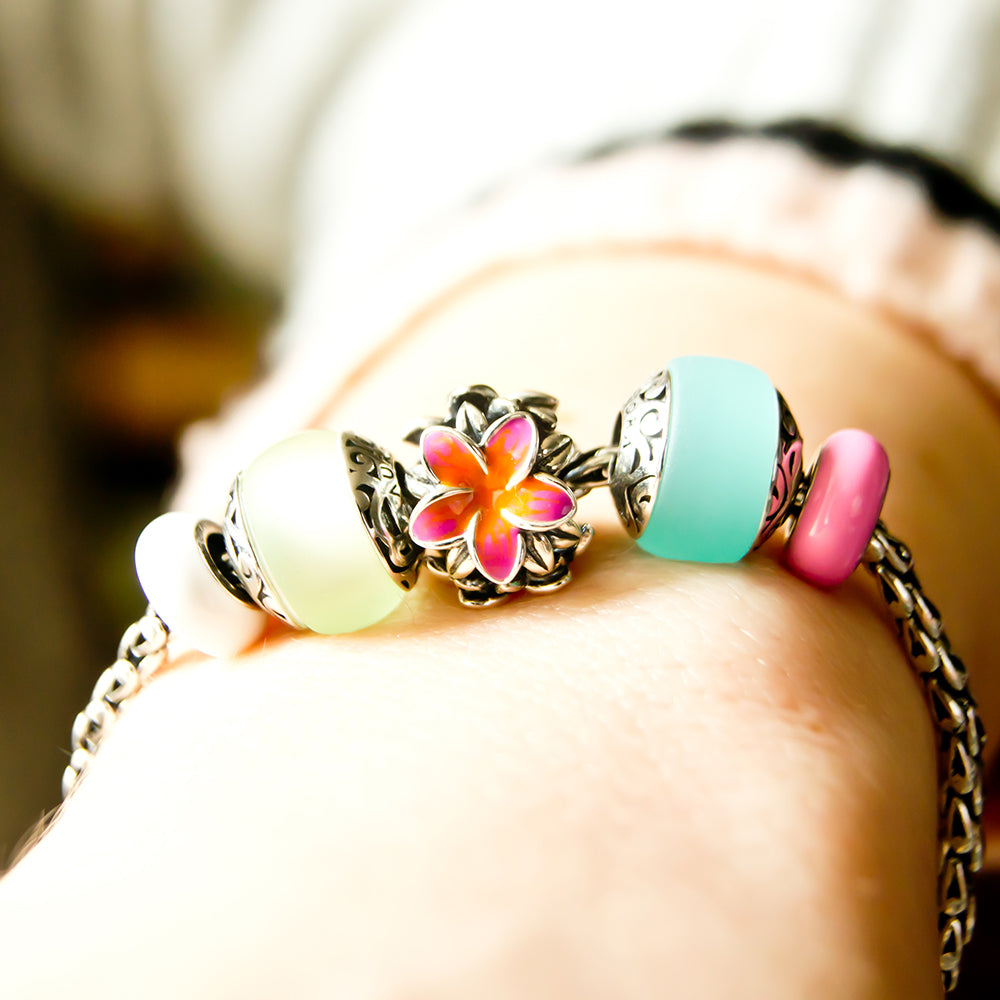 Aurora Charm Frangipani Orange Fuchsia Flower Charm silver; orange; pink sterling-silver; enamel Bead by The Alternative Bead. Your official Aurora Charm Retailer from Germany