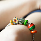 Aurora Charm Serenity Green Flower Bead silver; green sterling-silver; glass Bead by The Alternative Bead. Your official Aurora Charm Retailer from Germany