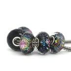 VIP-CHARMS Colorful Faceted Foil Charm 1pcs black; multicolor  Bead by The Alternative Bead. Your official VIP-CHARMS Retailer from Germany