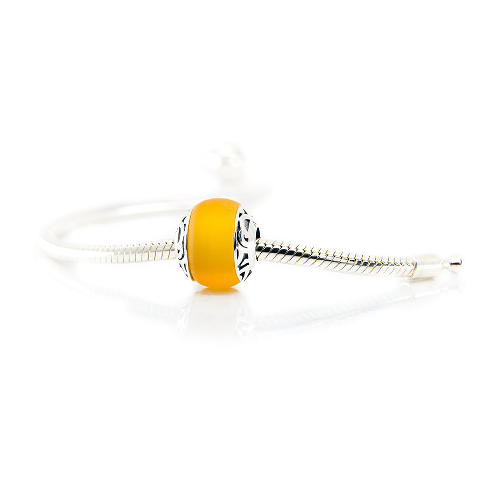 Aurora Charm Hiva Oa Island Yellow Sea Glass Bead silver; yellow sterling-silver; glass Bead by The Alternative Bead. Your official Aurora Charm Retailer from Germany