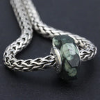 OHM Beads Abstract Aspects black; green natural-stone Bead by The Alternative Bead. Your official OHM Beads Retailer from Germany