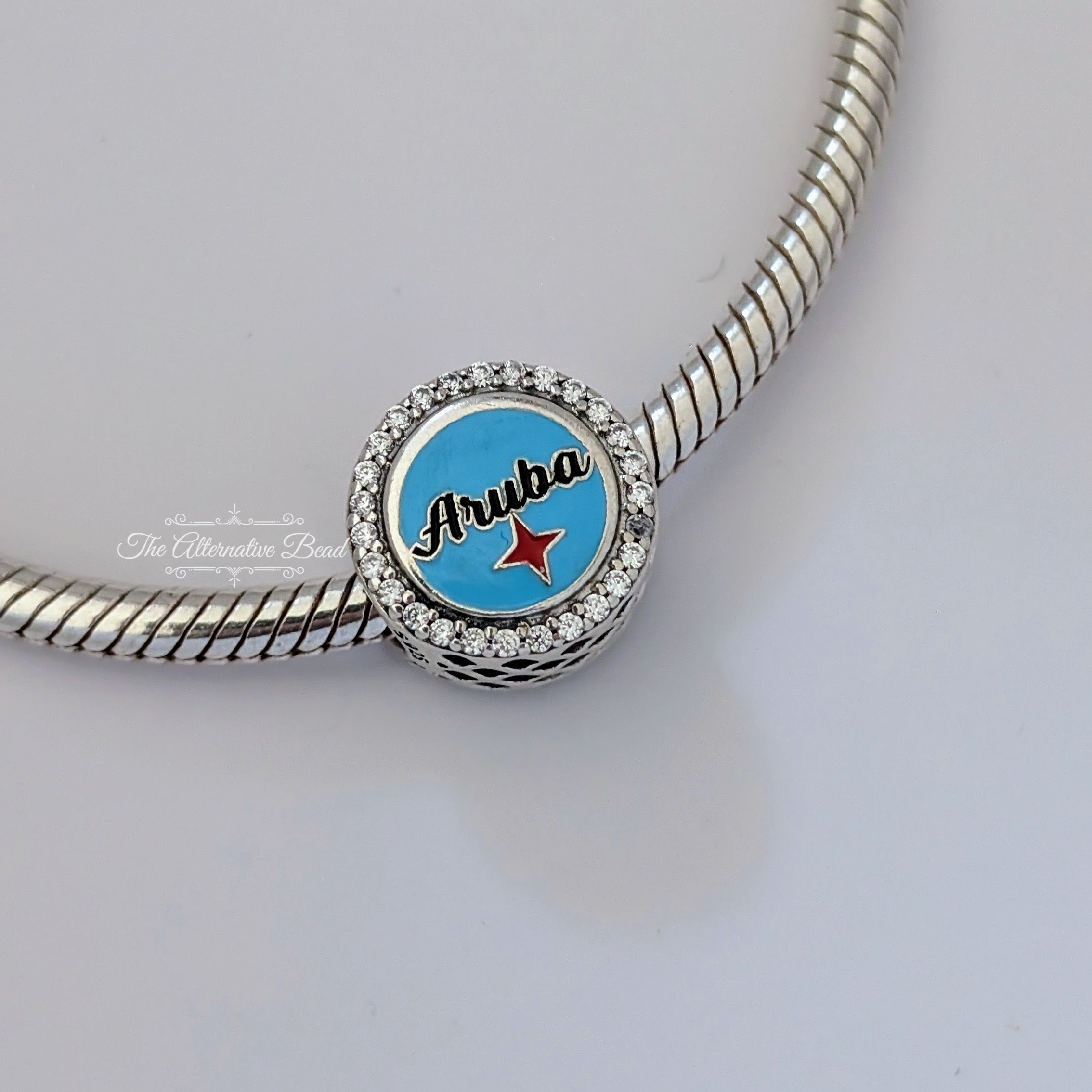 Pandora Aruba Cactus Double sided Button Charm Mix Enamel Clear Cubic Zirconia () silver and blue and green and yellow and white sterling-silver and enamel Bead by The Alternative Bead. Your Jewelry Retailer from Germany