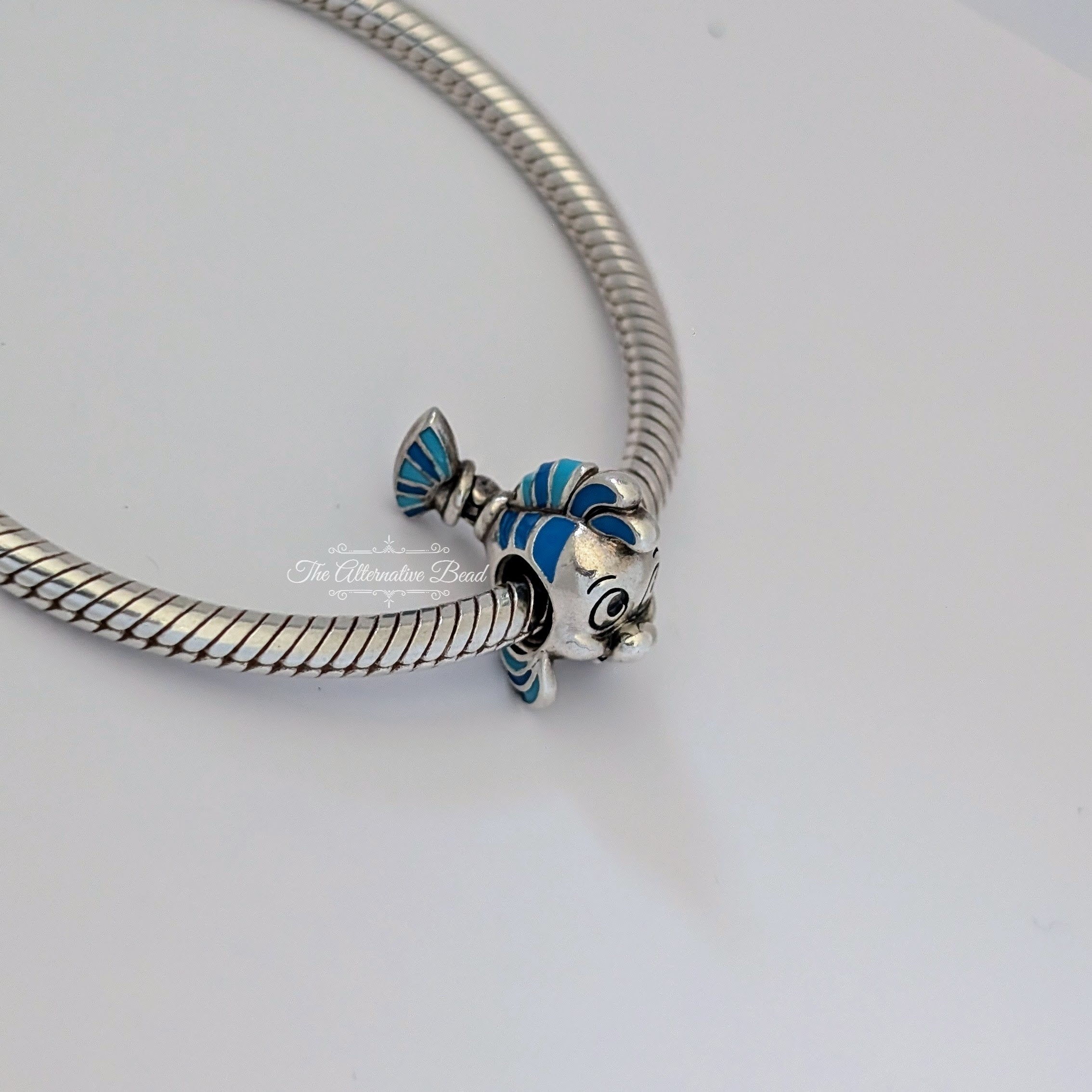 Disney x Pandora Flounder Sterling Silver Charm with Blue Enamel (798230ENMX) silver and blue sterling-silver and enamel Bead by The Alternative Bead. Your Jewelry Retailer from Germany