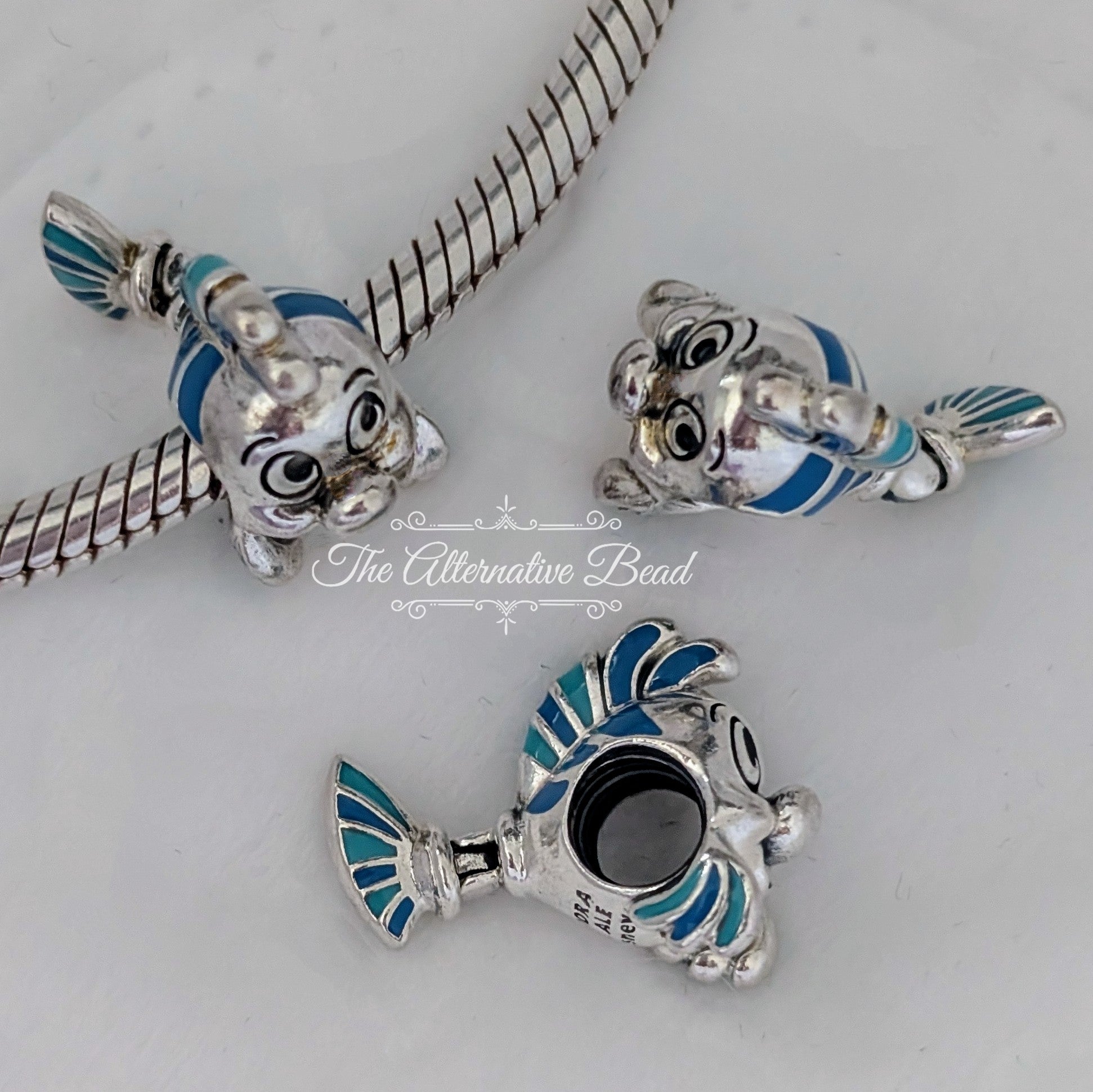 Disney x Pandora Flounder Sterling Silver Charm with Blue Enamel (798230ENMX) silver and blue sterling-silver and enamel Bead by The Alternative Bead. Your Jewelry Retailer from Germany