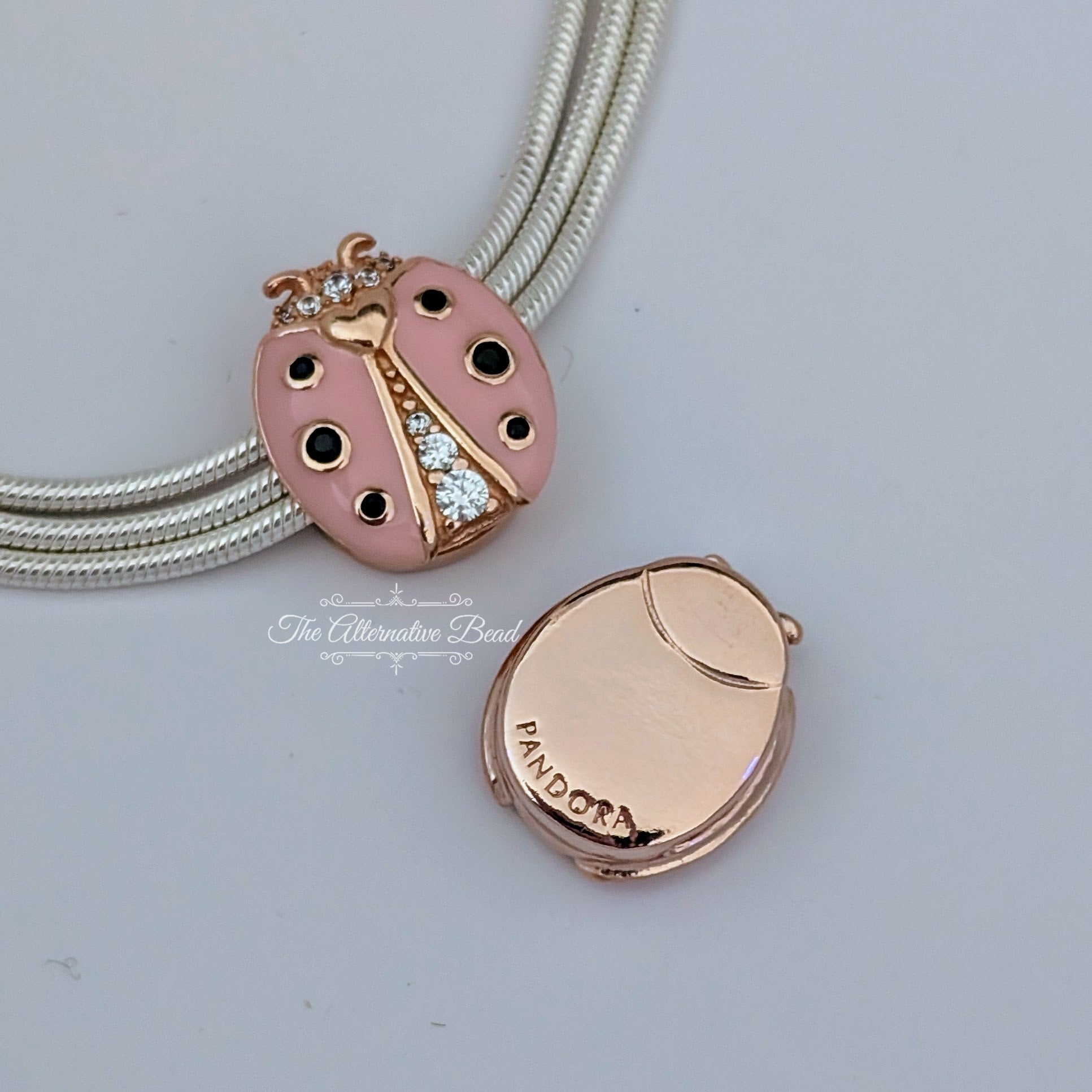 Pandora Rose Reflexions Pink Ladybird Clip (787970EN160) rose-gold and pink and black rose-gold and enamel Clip by The Alternative Bead. Your Jewelry Retailer from Germany