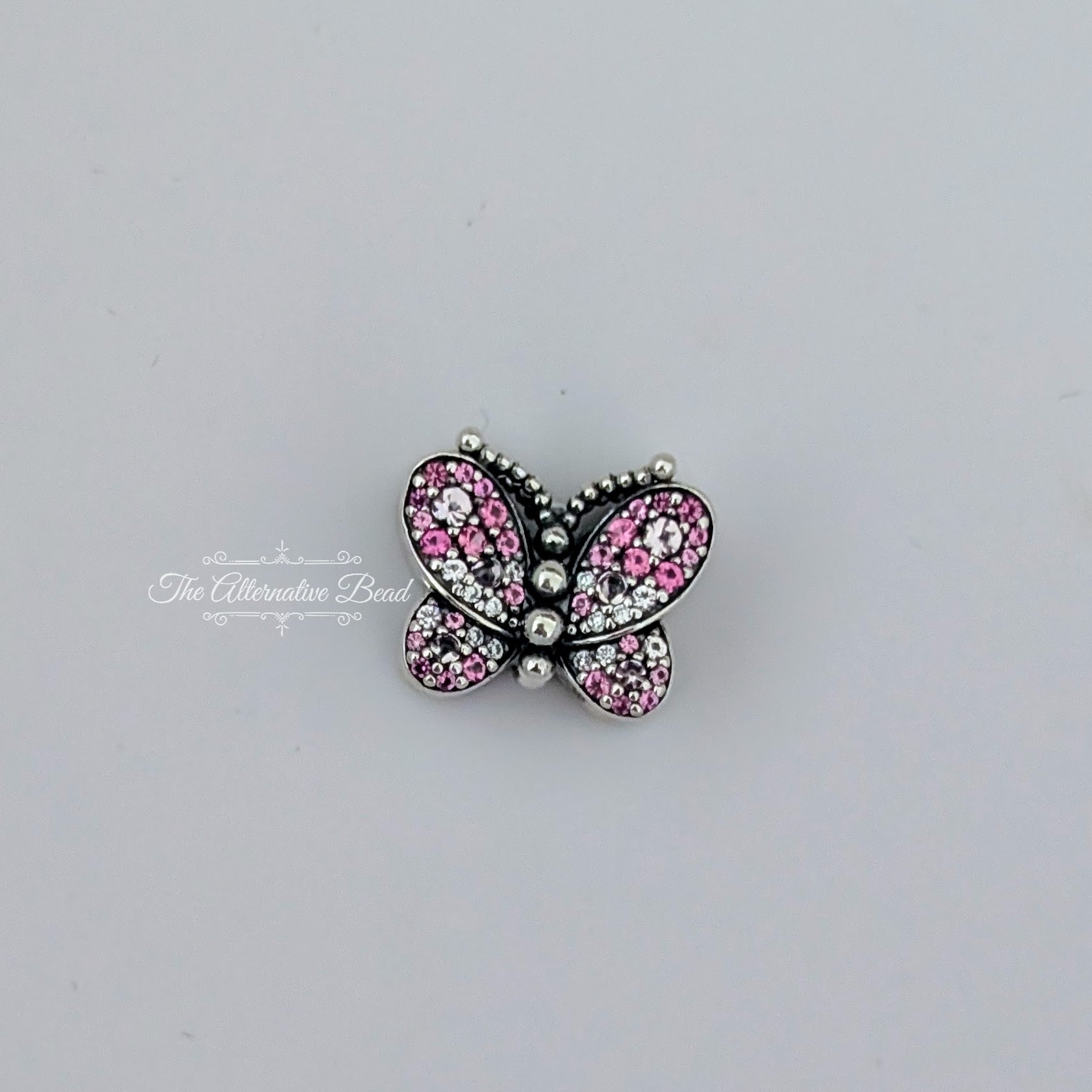 Pandora Dazzling Pink Butterfly Charm (797882NCCMX) silver and pink sterling-silver and crystal Bead by The Alternative Bead. Your Jewelry Retailer from Germany