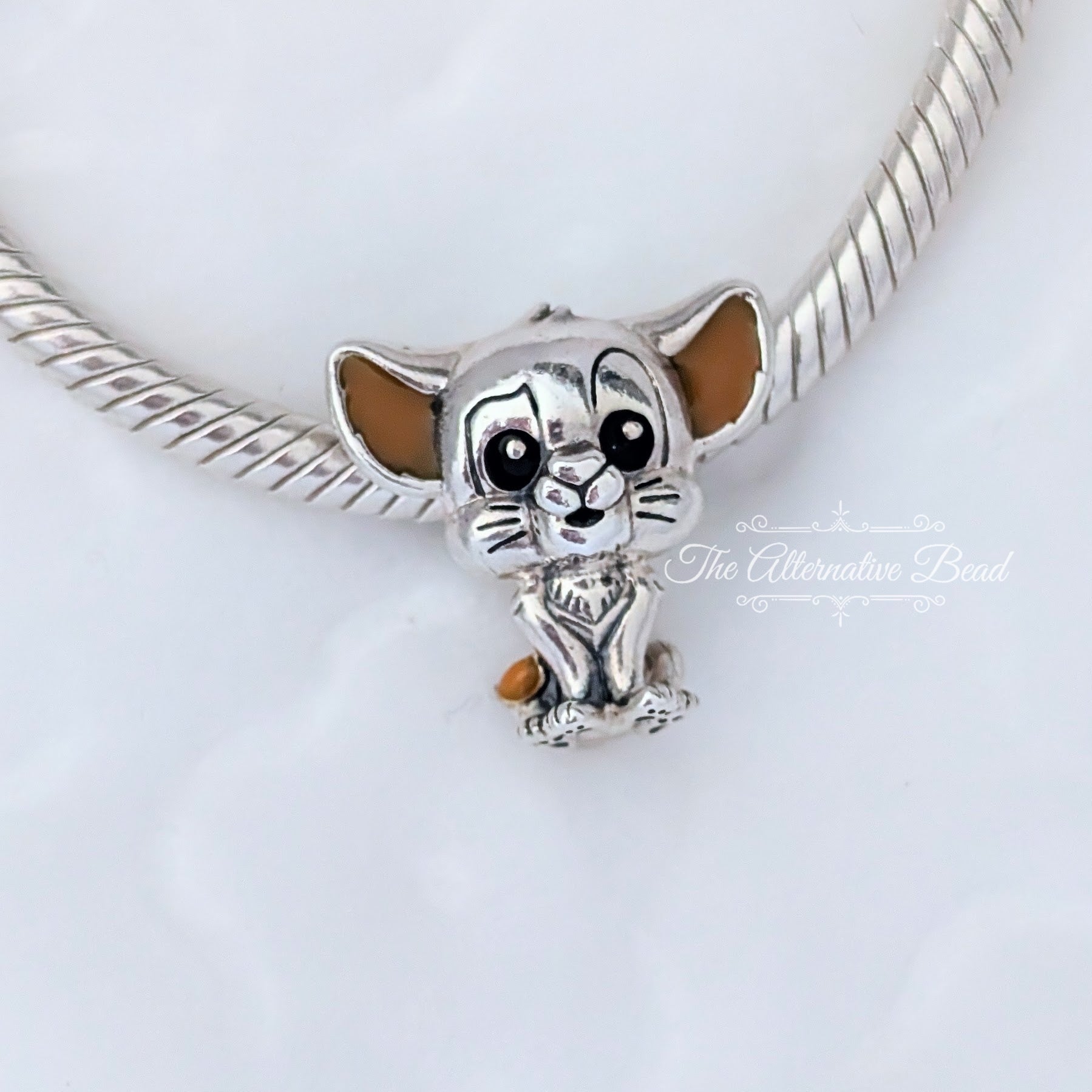 Disney x Pandora Simba Charm (799398C01) silver and brown sterling-silver and enamel Bead by The Alternative Bead. Your Jewelry Retailer from Germany