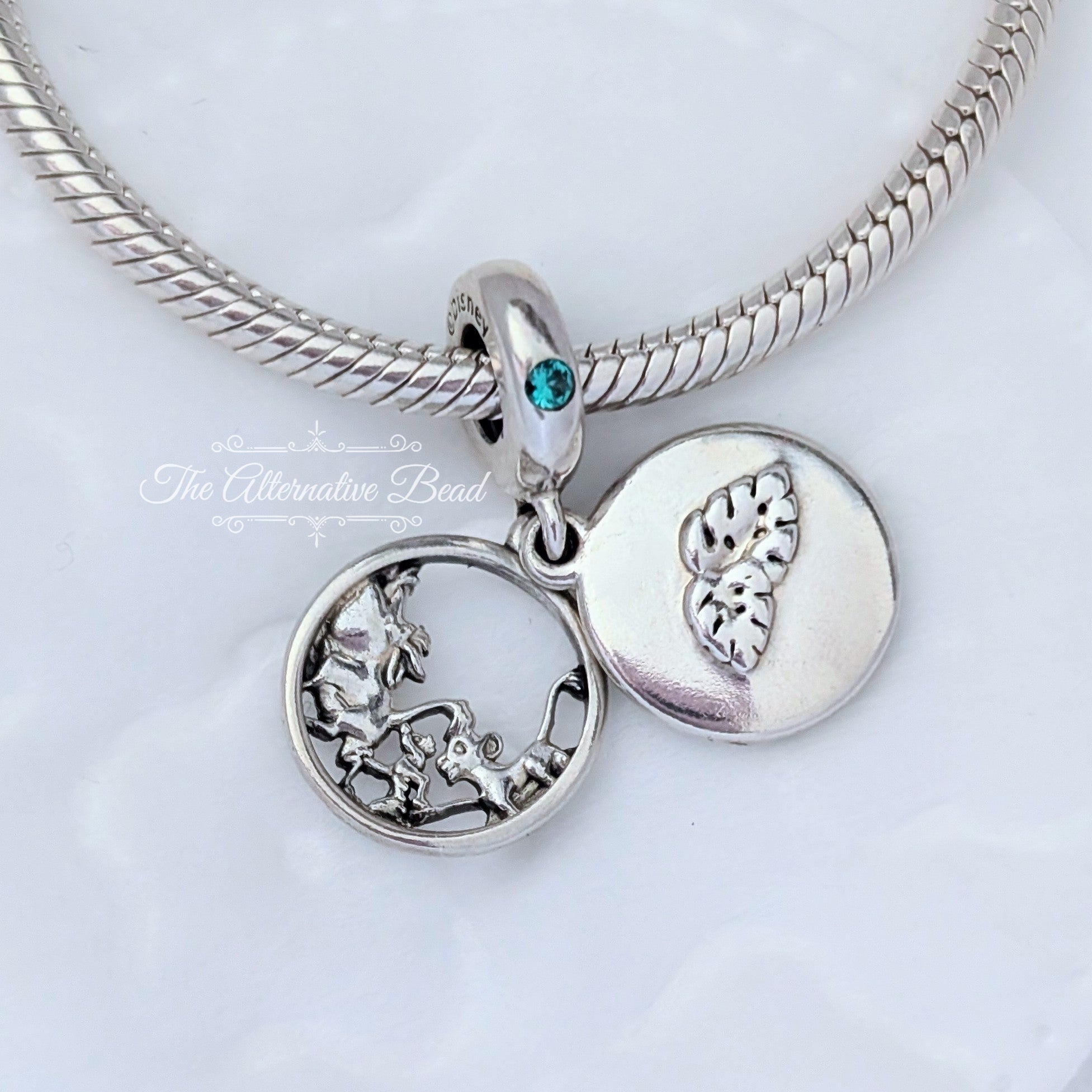 Disney x Pandora Simba, Pumbaa and Timon silver dangle with royal green crystal and green enamel (798043NRG) silver and green sterling-silver and enamel Dangle by The Alternative Bead. Your Jewelry Retailer from Germany