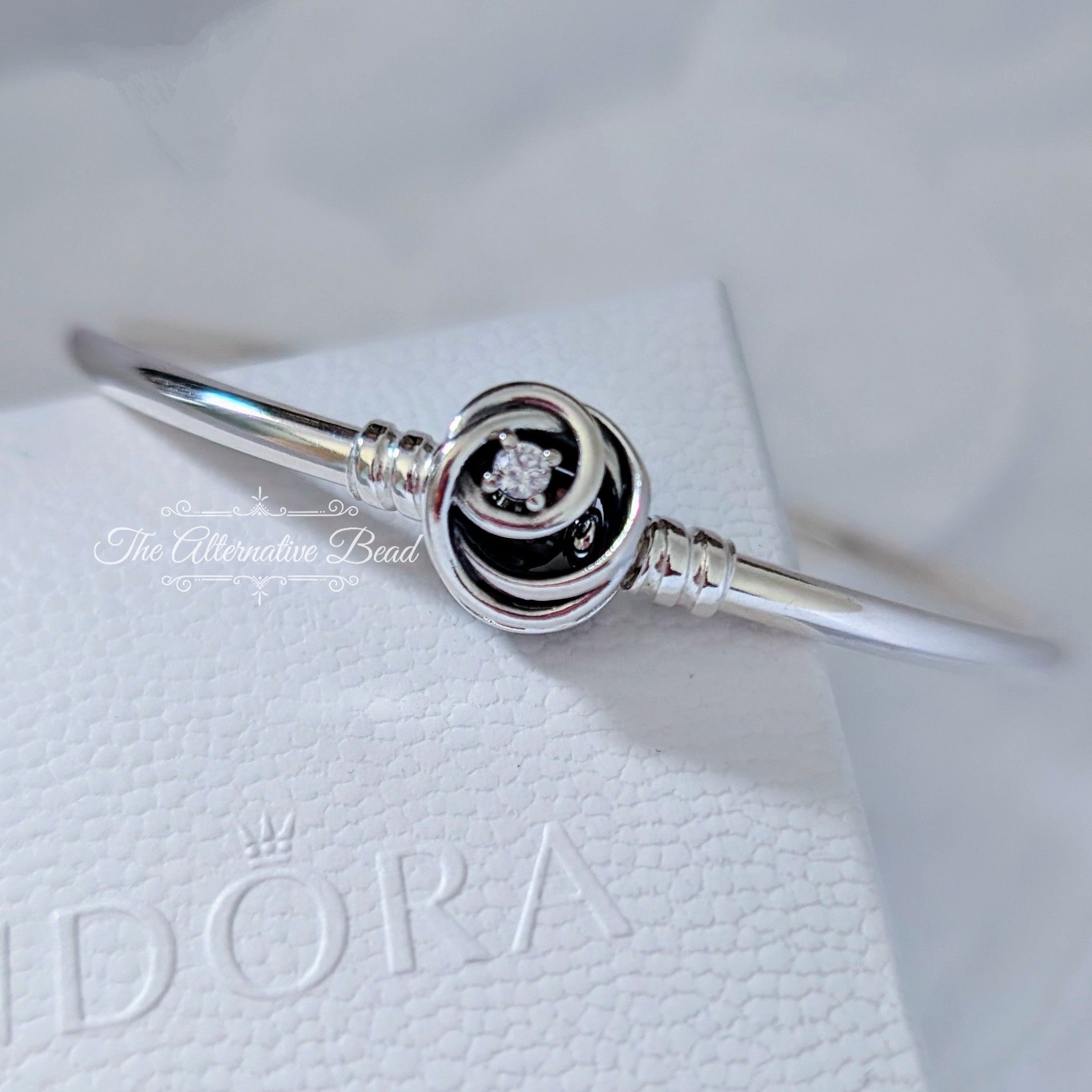 Pandora Moments Encircled Clasp Bangle (593229C01) silver sterling-silver Bangle by The Alternative Bead. Your Jewelry Retailer from Germany