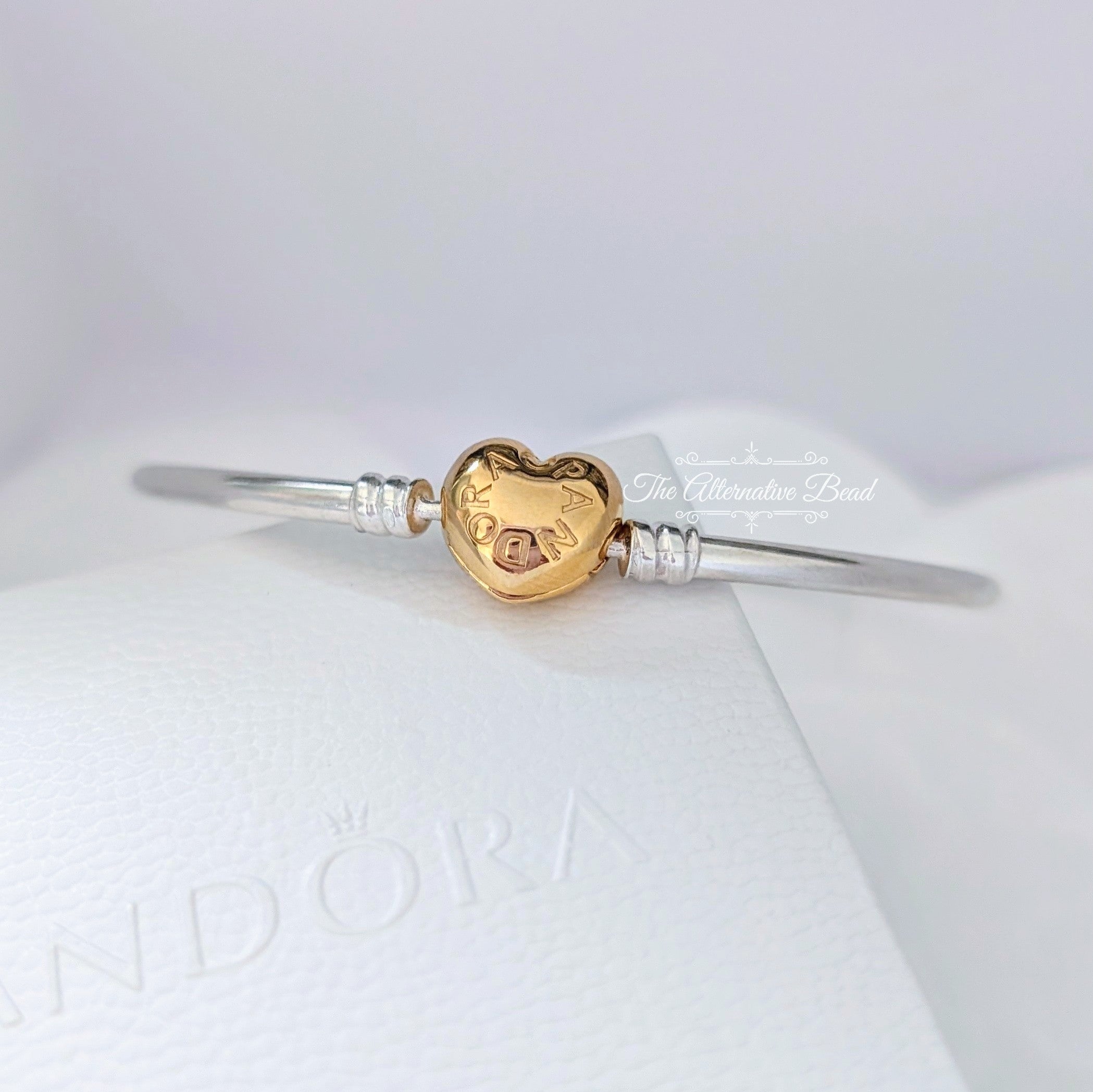 Pandora Pandora Moments Heart Clasp Bangle (567163) silver and gold sterling-silver and gold Bangle by The Alternative Bead. Your Jewelry Retailer from Germany