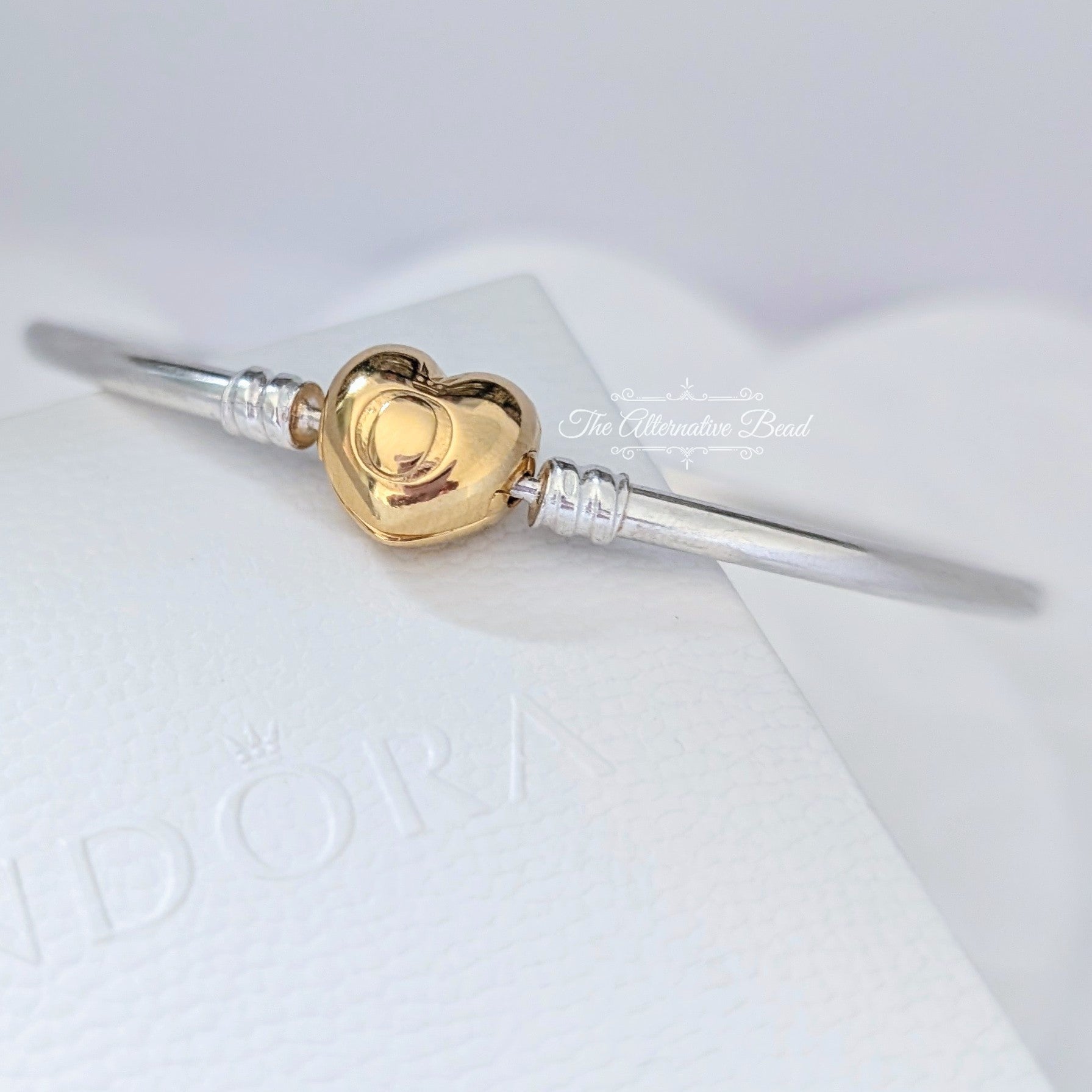 Pandora Pandora Moments Heart Clasp Bangle (567163) silver and gold sterling-silver and gold Bangle by The Alternative Bead. Your Jewelry Retailer from Germany