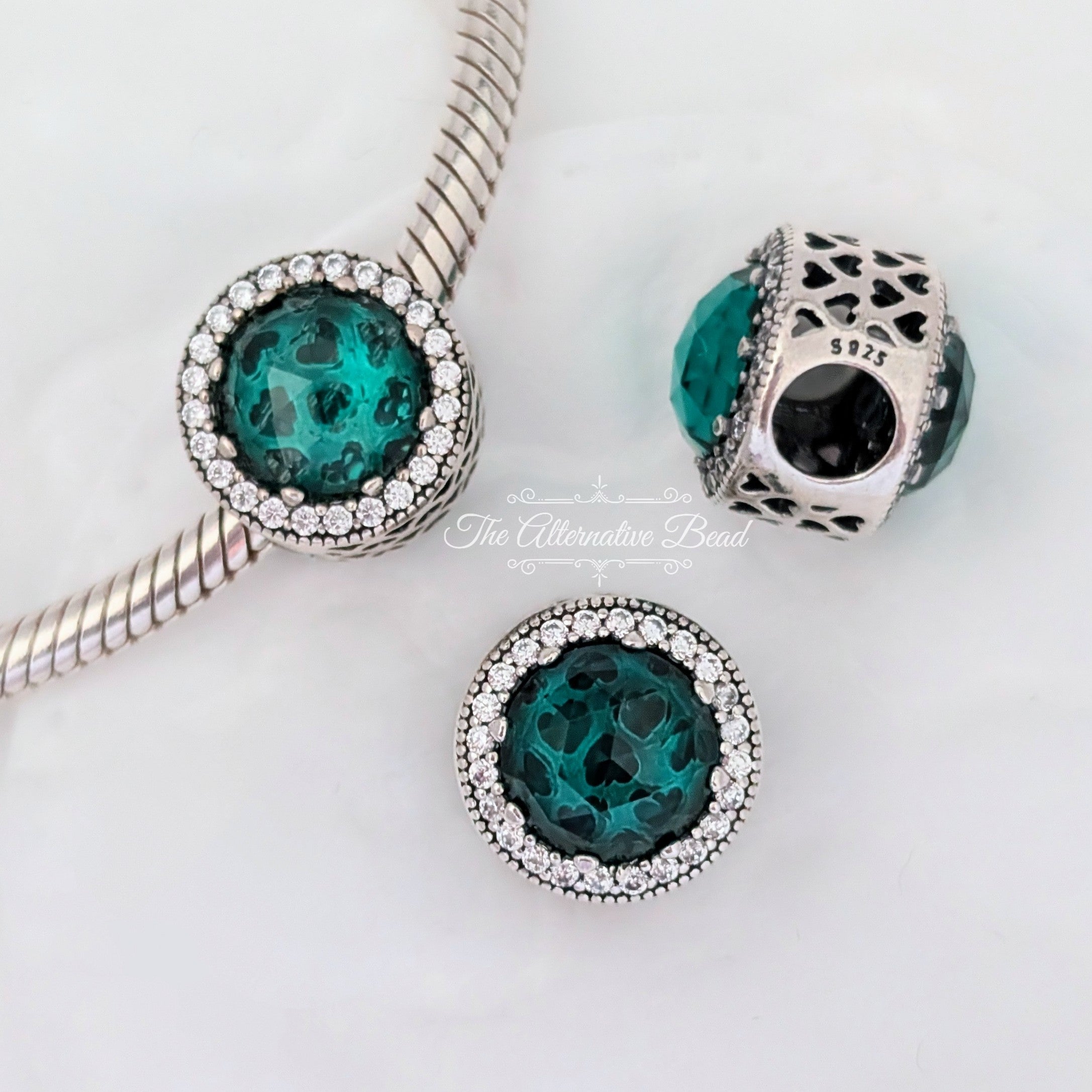 Pandora Green Radiant Hearts (791725NSG) green sterling-silver and glass Bead by The Alternative Bead. Your Jewelry Retailer from Germany