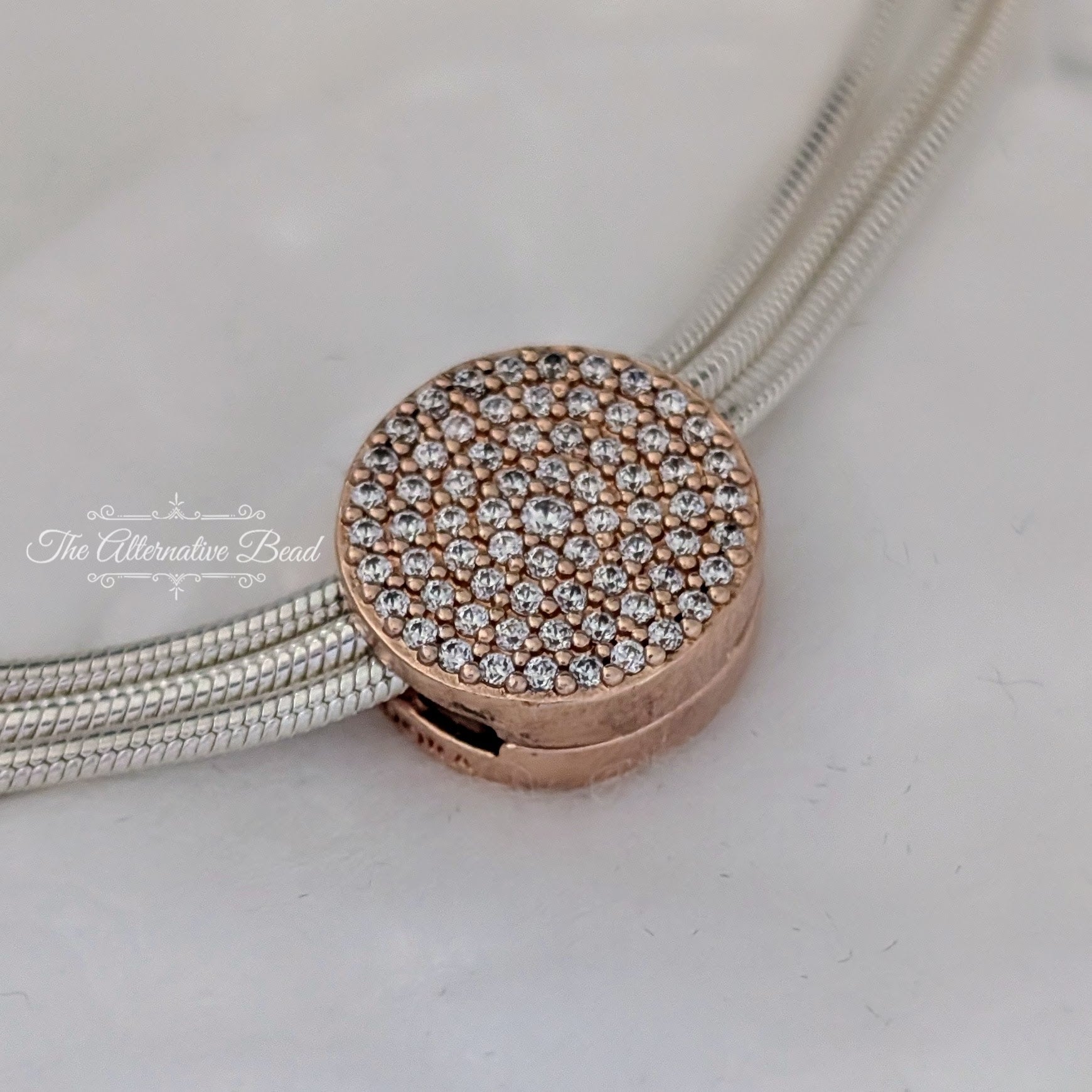 Pandora Reflexions Round Pavé Charm (787583CZ) rose-gold rose-gold Clip by The Alternative Bead. Your Jewelry Retailer from Germany