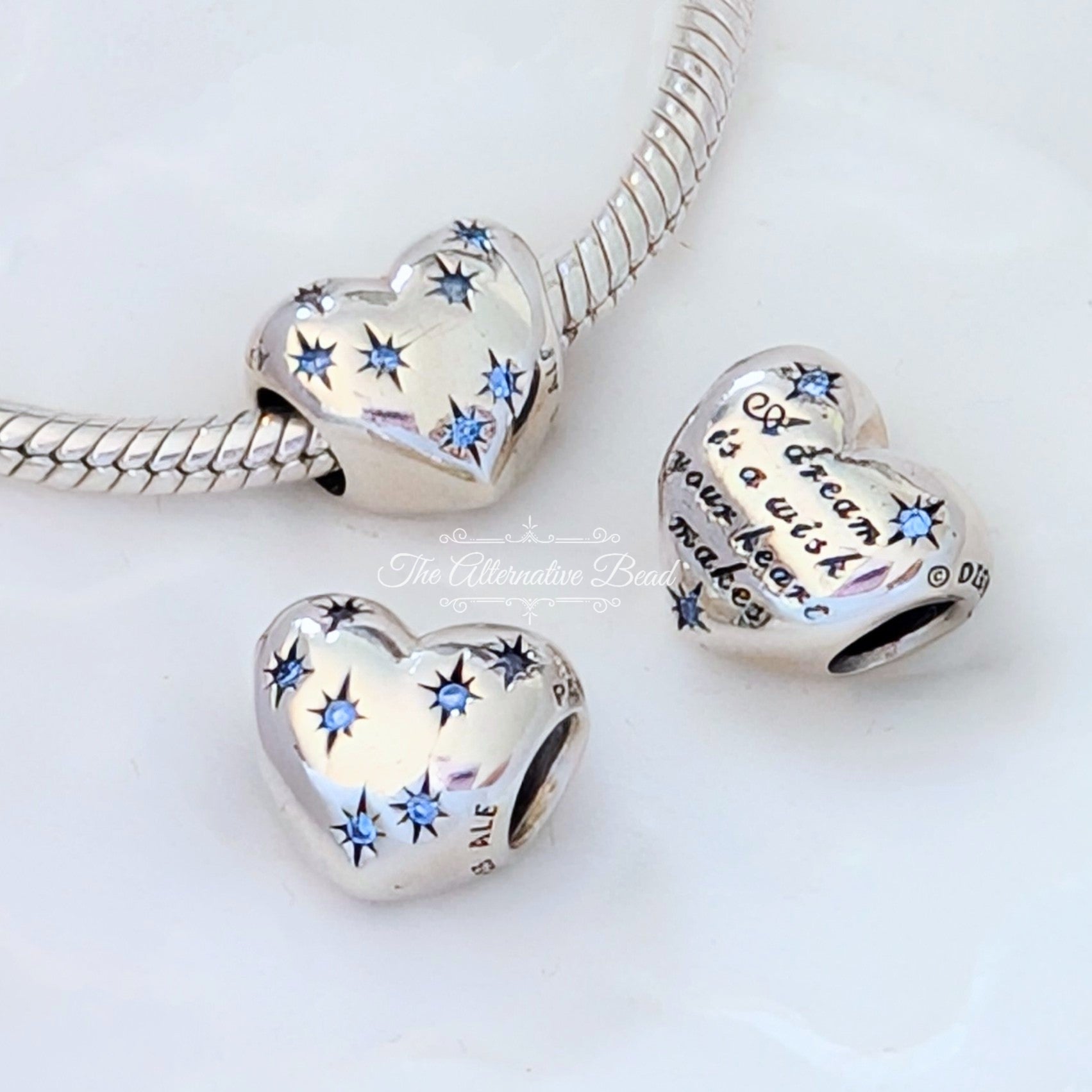 Disney x Pandora Cinderella Heart with Light Blue Cubic Zirconia (791593CFL) blue and silver sterling-silver Bead by The Alternative Bead. Your Jewelry Retailer from Germany