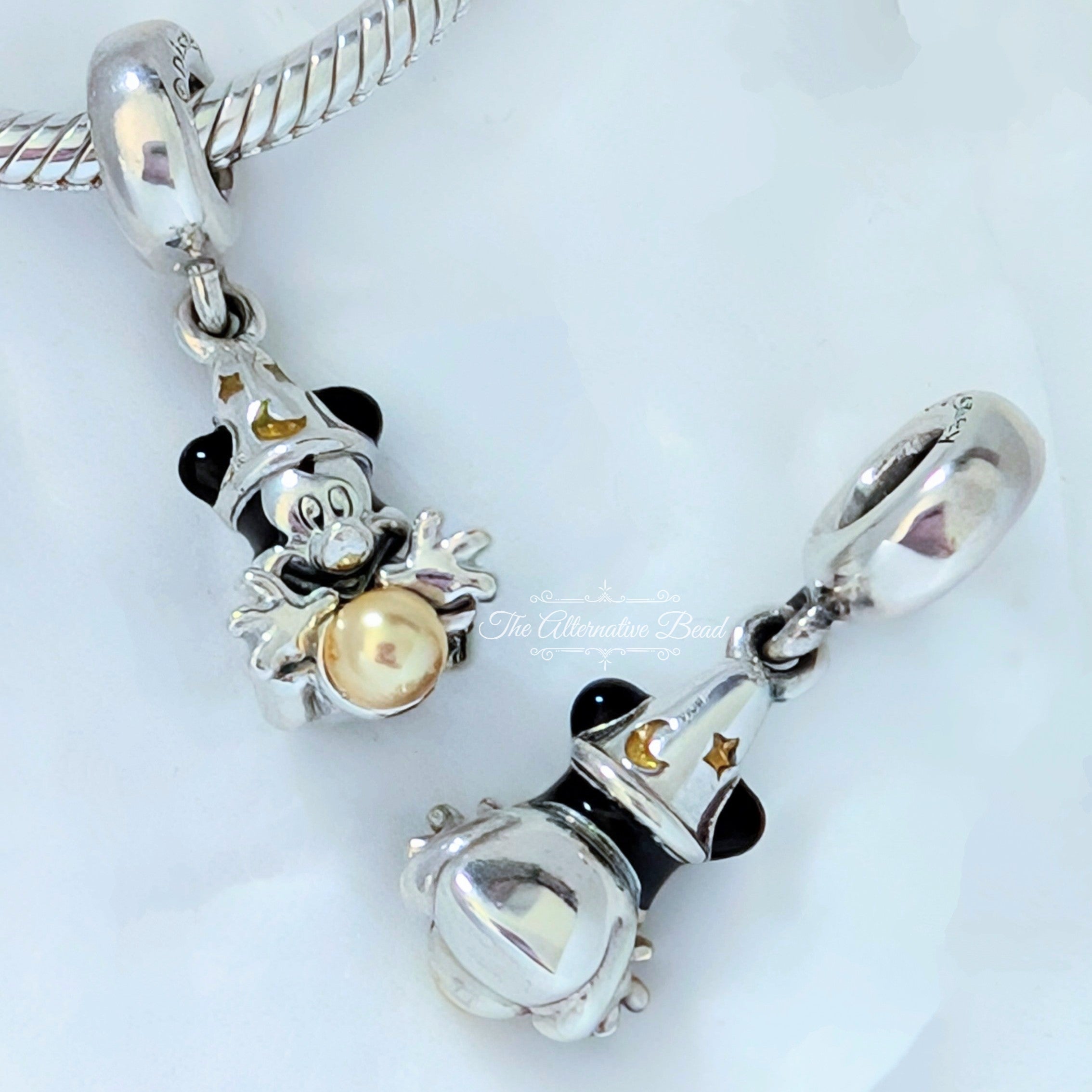 Disney x Pandora Disney Mickey sorcerer silver dangle with enamel and golden coloured lacquered artificial pearl (797493ENMX) silver and gold and black sterling-silver and enamel Dangle by The Alternative Bead. Your Jewelry Retailer from Germany