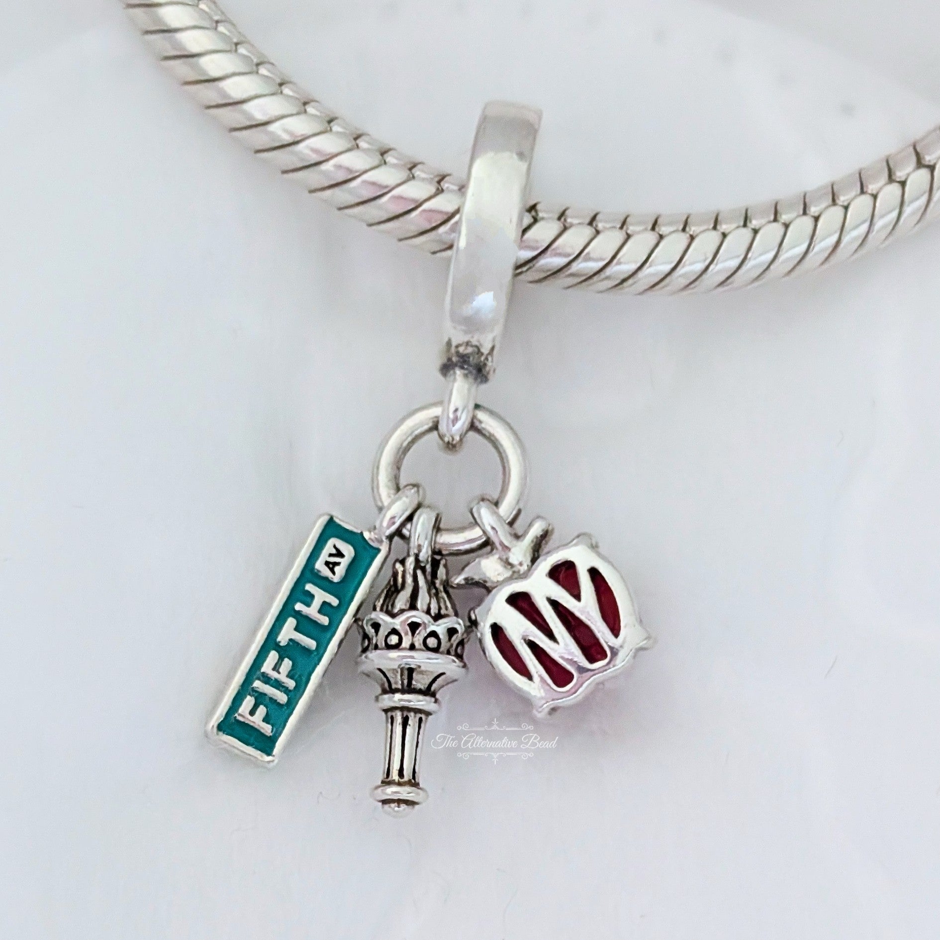 Pandora NYC Apple, Torch and Street Sign Triple Dangle (792718C01) silver and multicolor sterling-silver and enamel Dangle by The Alternative Bead. Your Jewelry Retailer from Germany