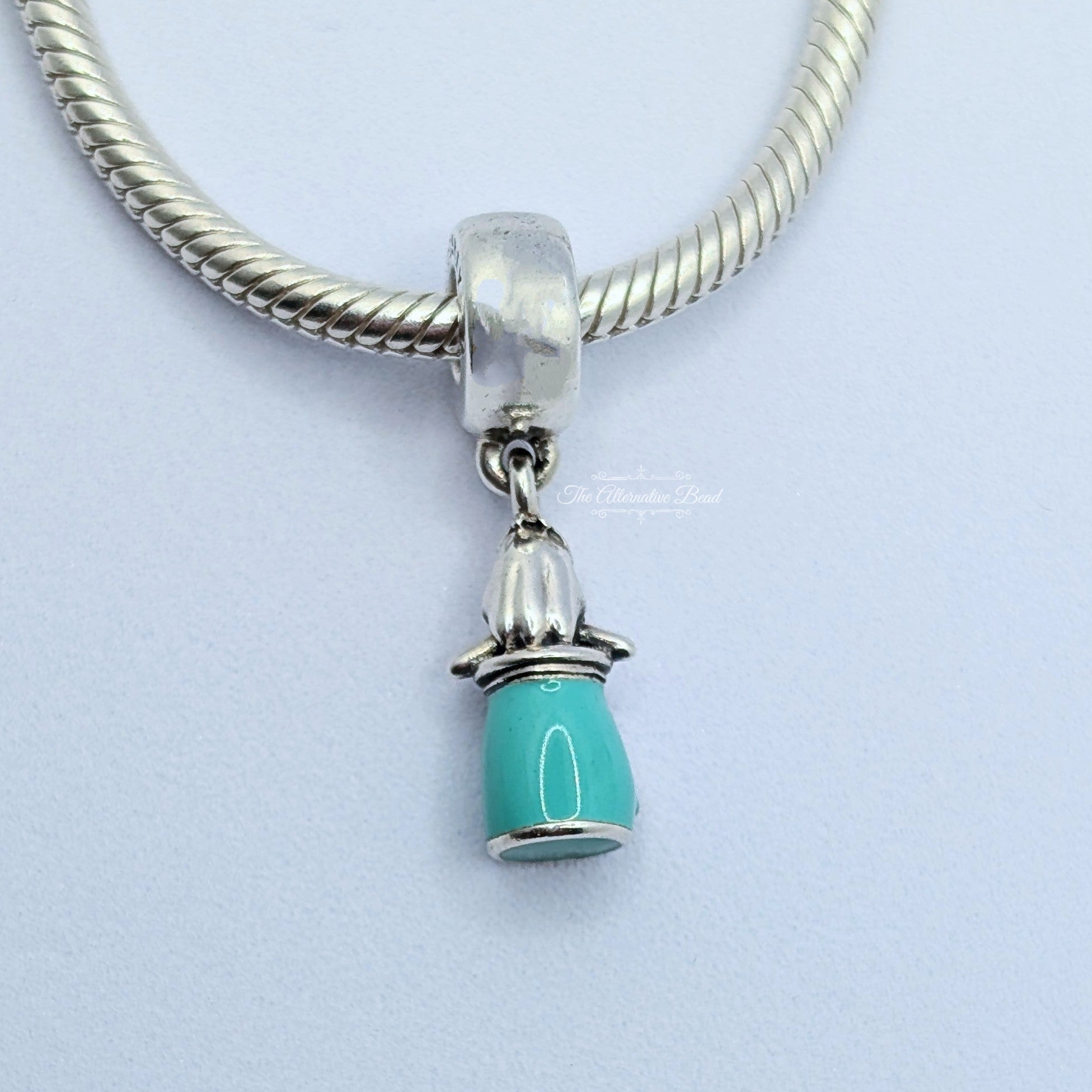 Disney x Pandora Disney Alice in Wonderland Drink Me Dangle Charm (First Version) (799334C01) blue and white and green sterling-silver and enamel Dangle by The Alternative Bead. Your Jewelry Retailer from Germany