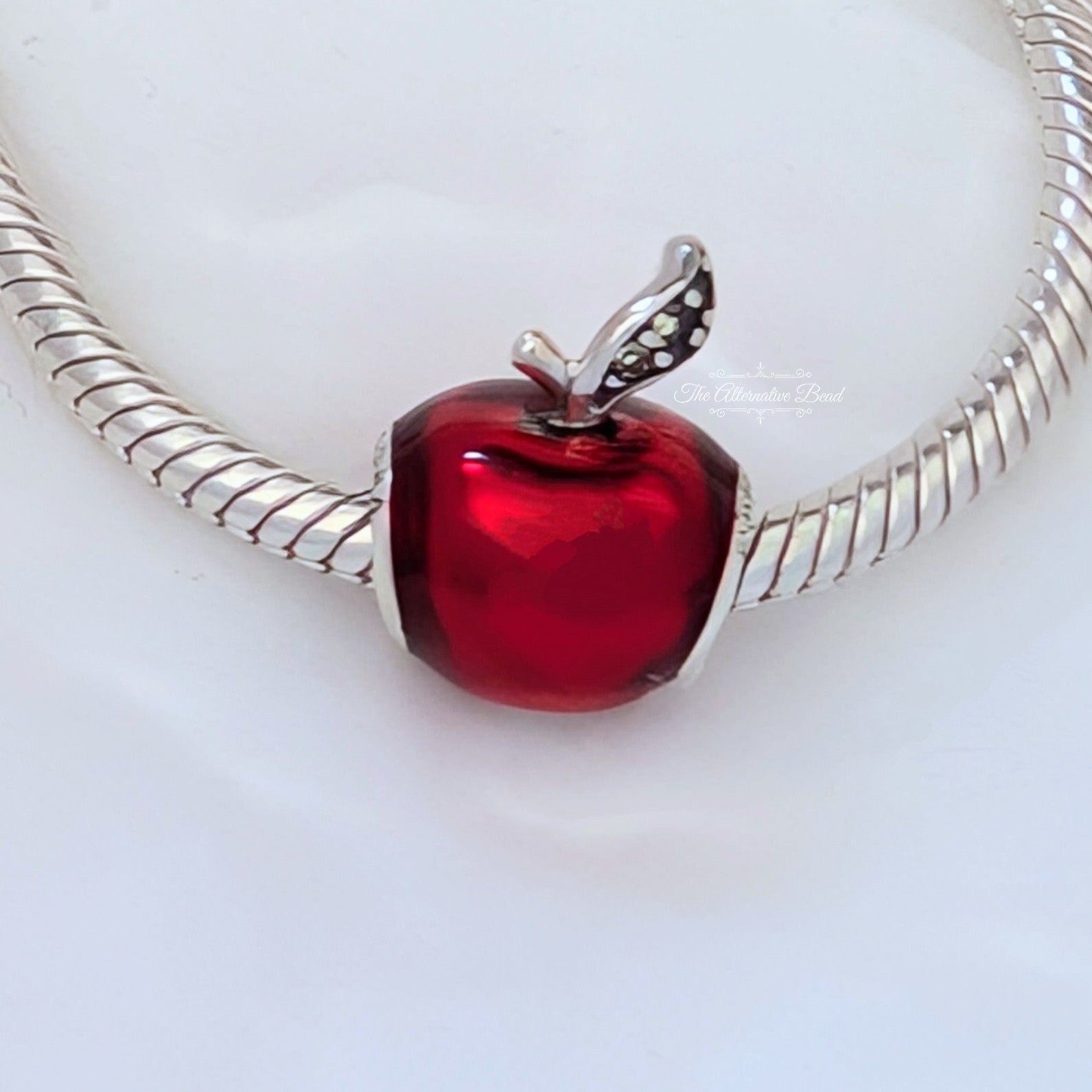 Disney x Pandora Disney Snow White apple silver charm with red enamel and dark green cubic zirconia (791572EN73) red and silver sterling-silver and enamel Bead by The Alternative Bead. Your Jewelry Retailer from Germany