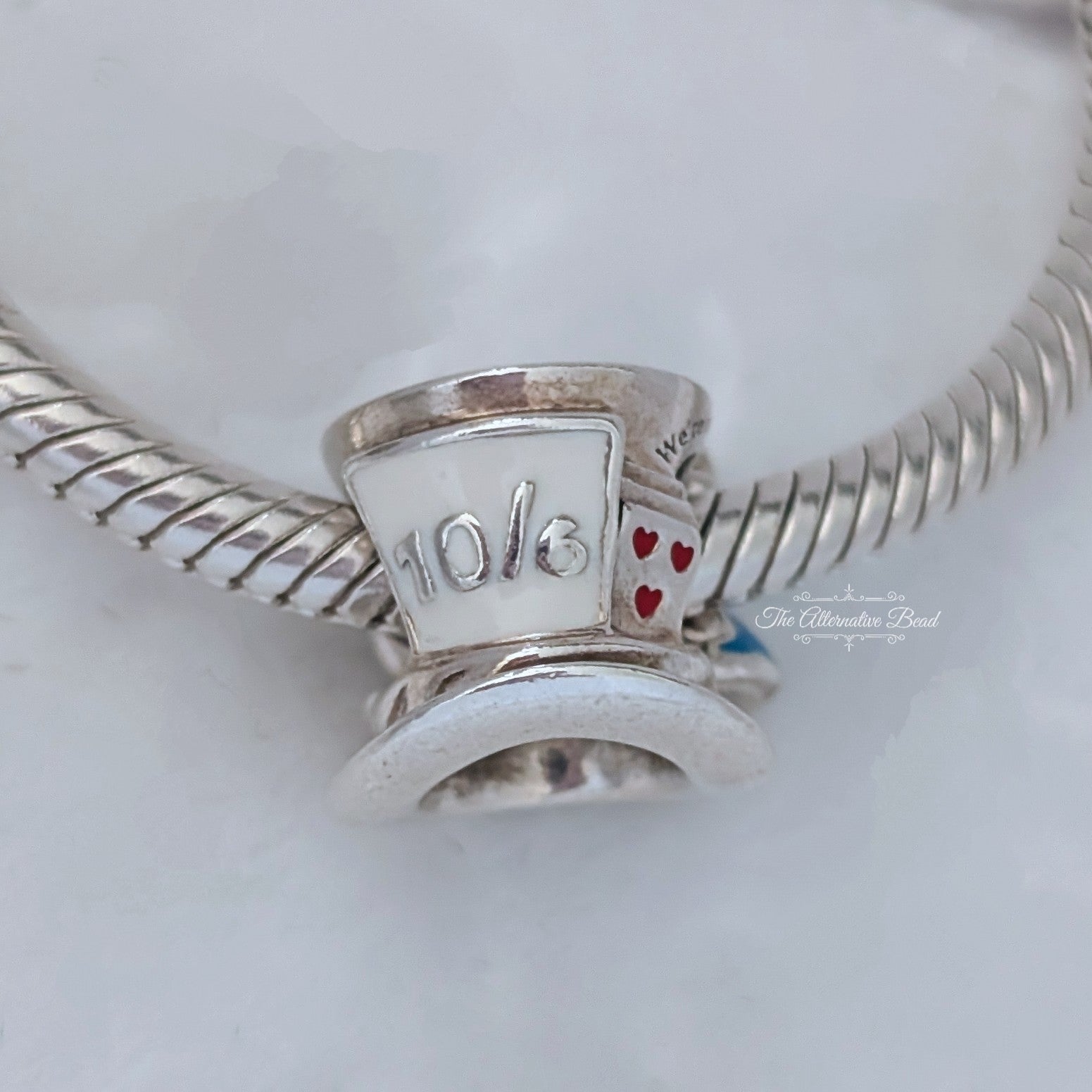Disney x Pandora Disney Alice in Wonderland & The Mad Hatter's Tea Party Charm (799348C01) silver and pink and purple sterling-silver and enamel Bead by The Alternative Bead. Your Jewelry Retailer from Germany