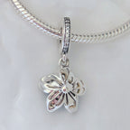 Pandora Blue Blossom Dangle Charm (790667C02 / 760667C01) gold and silver sterling-silver and enamel Dangle by The Alternative Bead. Your Jewelry Retailer from Germany