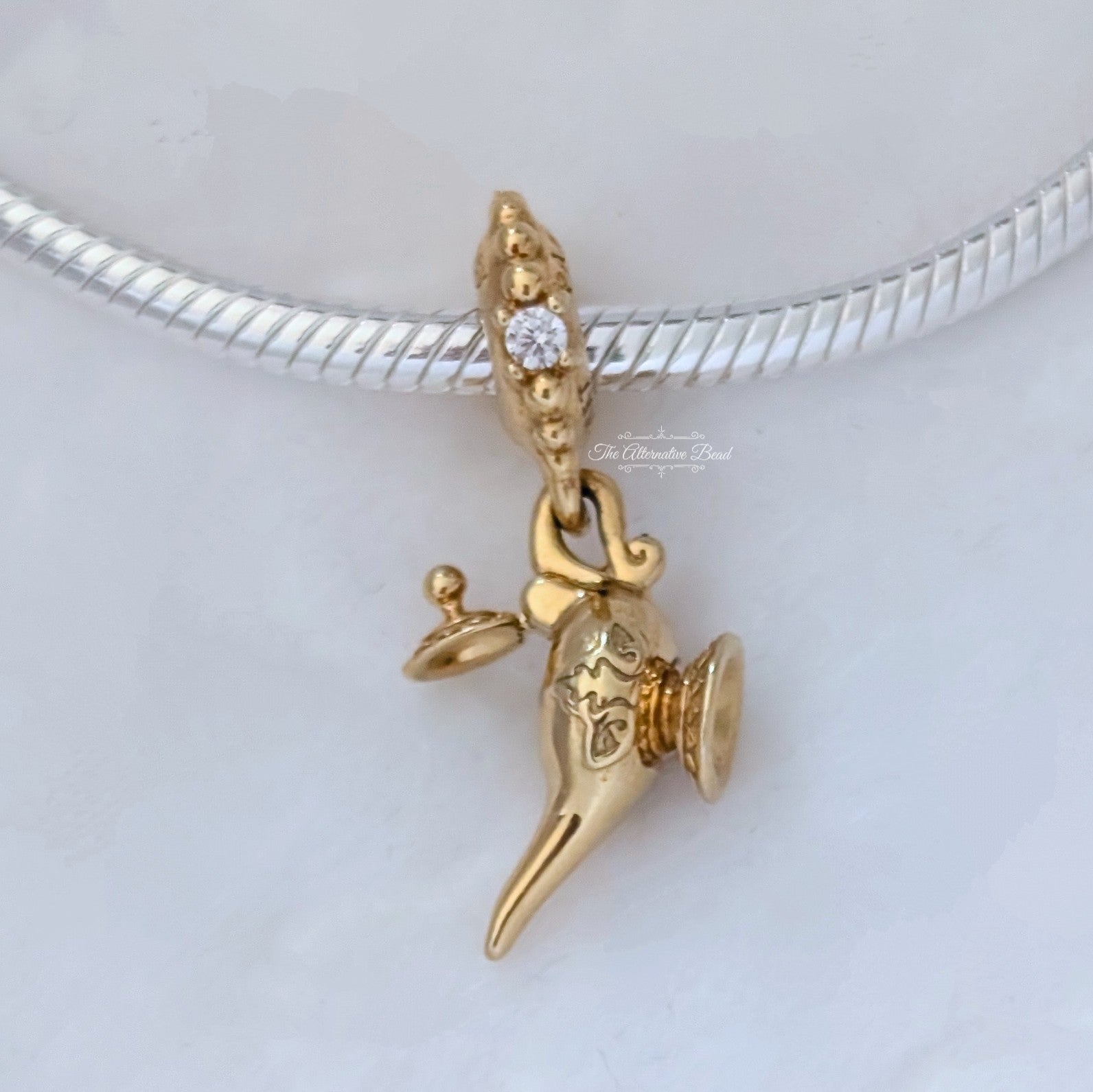 Disney x Pandora Aladdin Magic Lamp Dangle Charm gold gold-plated Dangle by The Alternative Bead. Your Jewelry Retailer from Germany