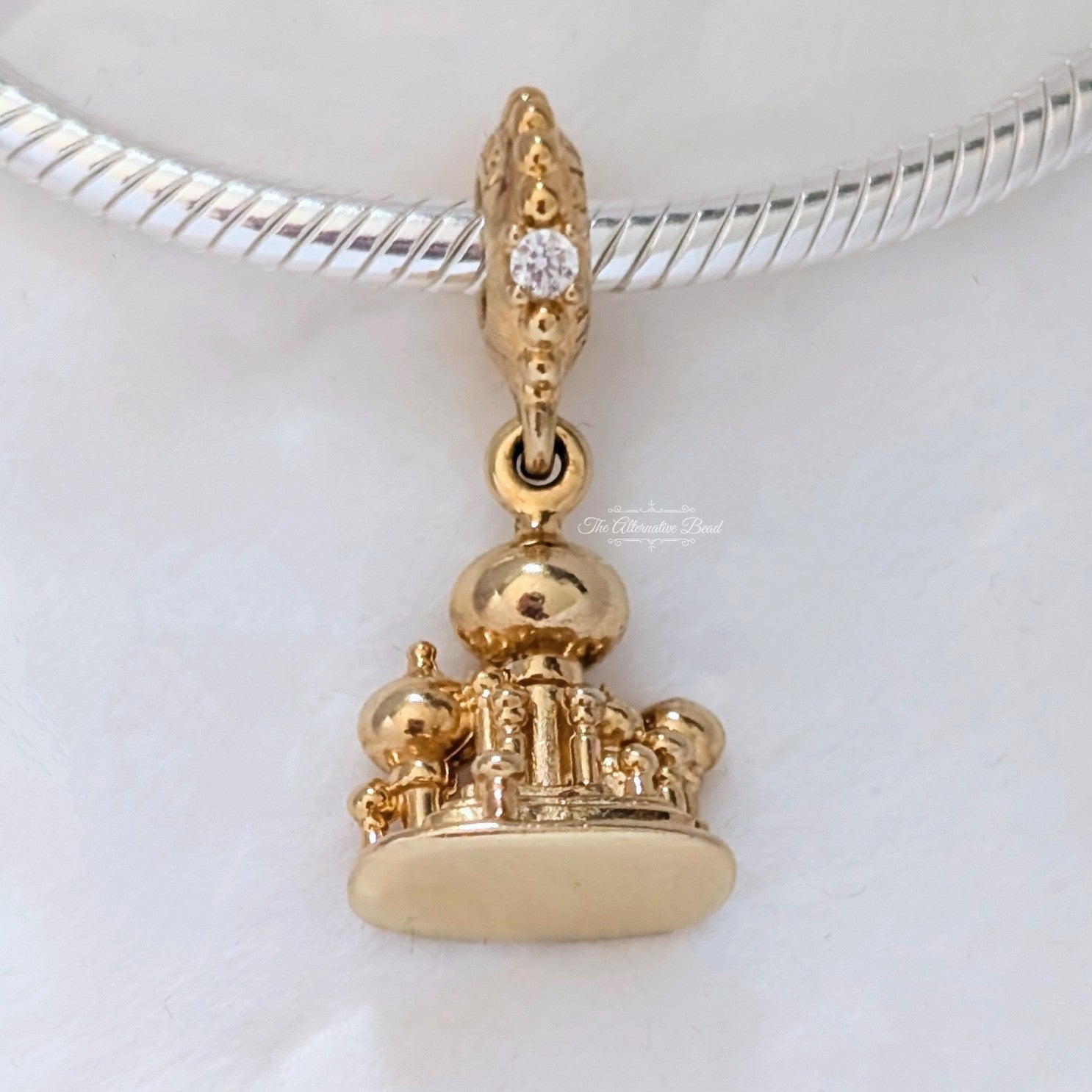 Disney x Pandora Aladdin Agrabah Castle Dangle Charm gold sterling-silver and gold-plated Dangle by The Alternative Bead. Your Jewelry Retailer from Germany