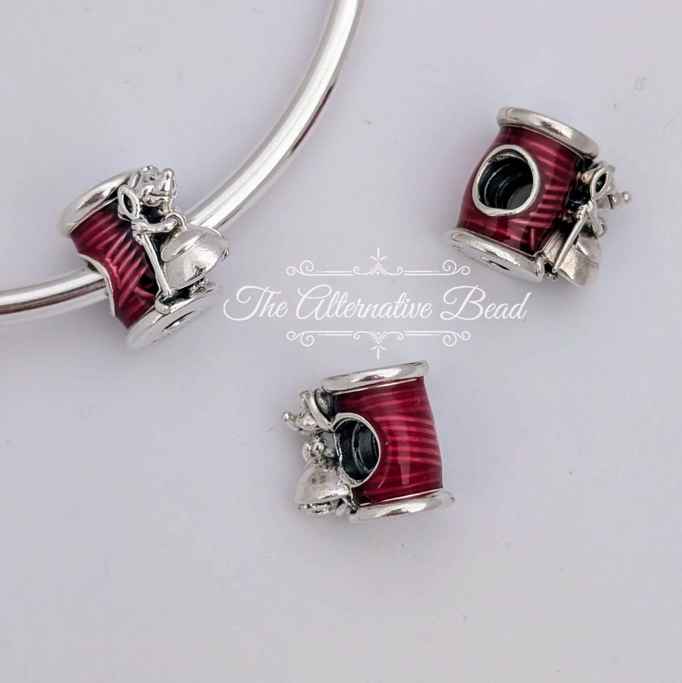 Disney x Pandora Cinderella Suzy Mouse Needle & Thread (799200C01) silver and pink sterling-silver and enamel Bead by The Alternative Bead. Your Jewelry Retailer from Germany