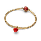 Disney x Pandora Disney Beauty and the Beast Enchanted Rose Dangle Charm red and gold gold-plated and glass Dangle by The Alternative Bead. Your Jewelry Retailer from Germany