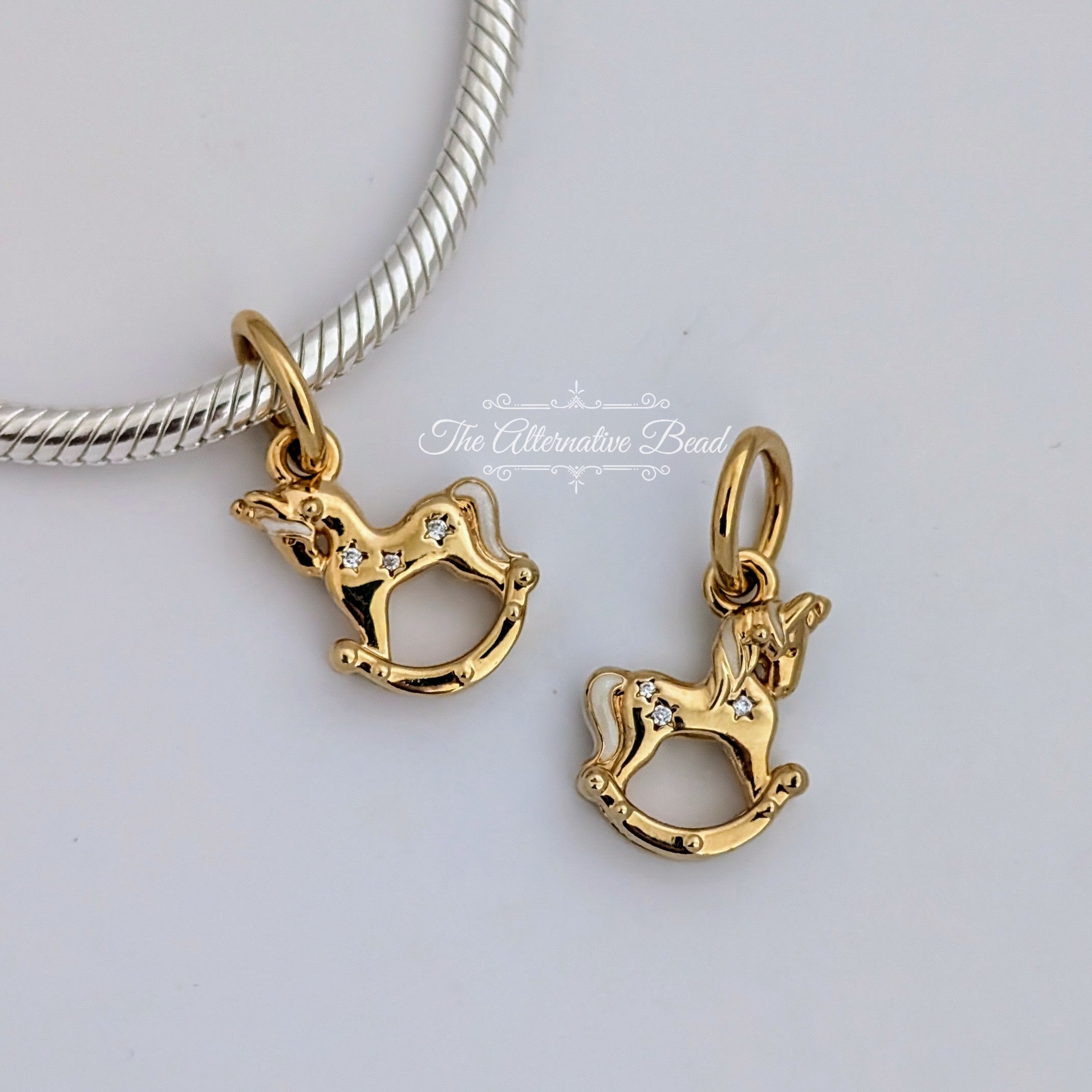 Pandora Rocking Unicorn Dangle Charm (762978C01) gold and silver sterling-silver and gold and enamel Dangle by The Alternative Bead. Your Jewelry Retailer from Germany