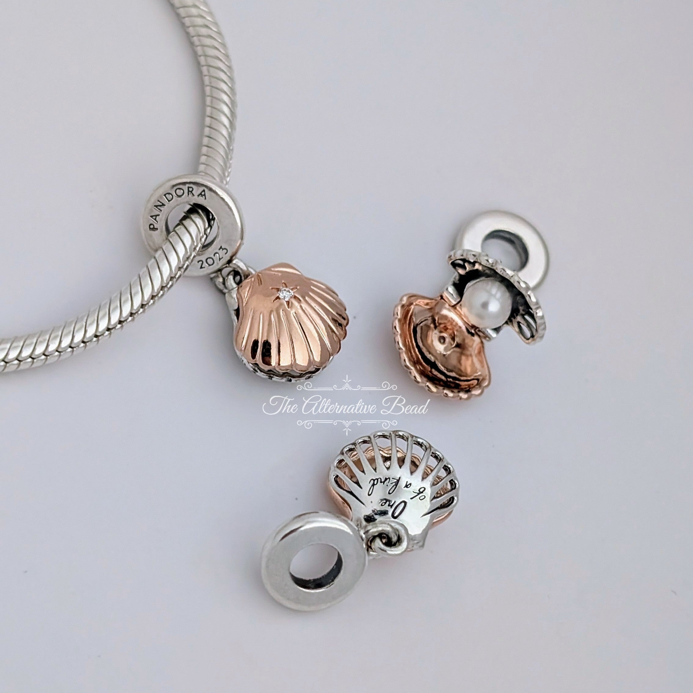 Pandora Pandora Club 2023 Sea Shell & Treated Freshwater Cultured Pearl Dangle Charm (782449C01) rose-gold and silver sterling-silver and rose-gold Dangle by The Alternative Bead. Your Jewelry Retailer from Germany