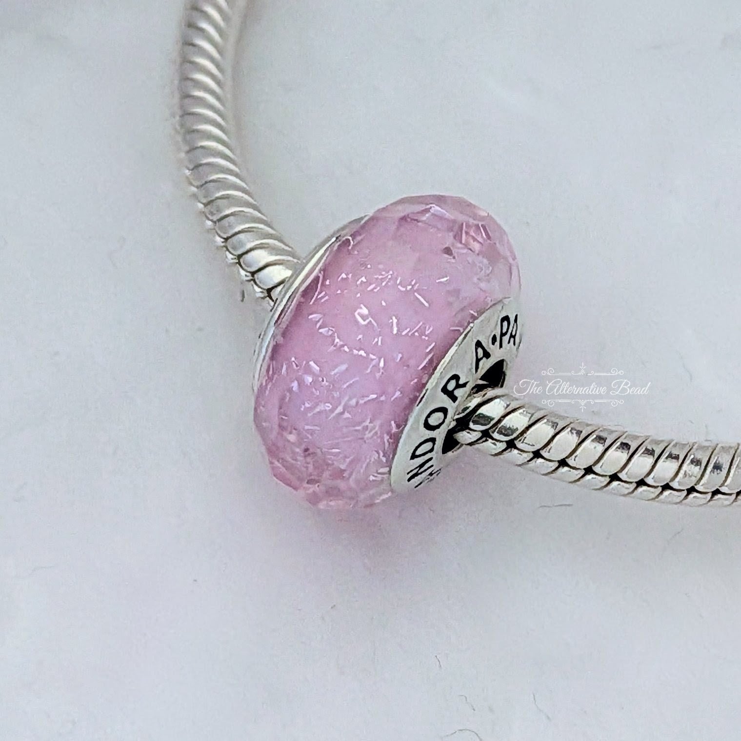 Pandora Faceted Iridescent Pink Murano Glass Charm pink glass Bead by The Alternative Bead. Your official Pandora Retailer from Germany