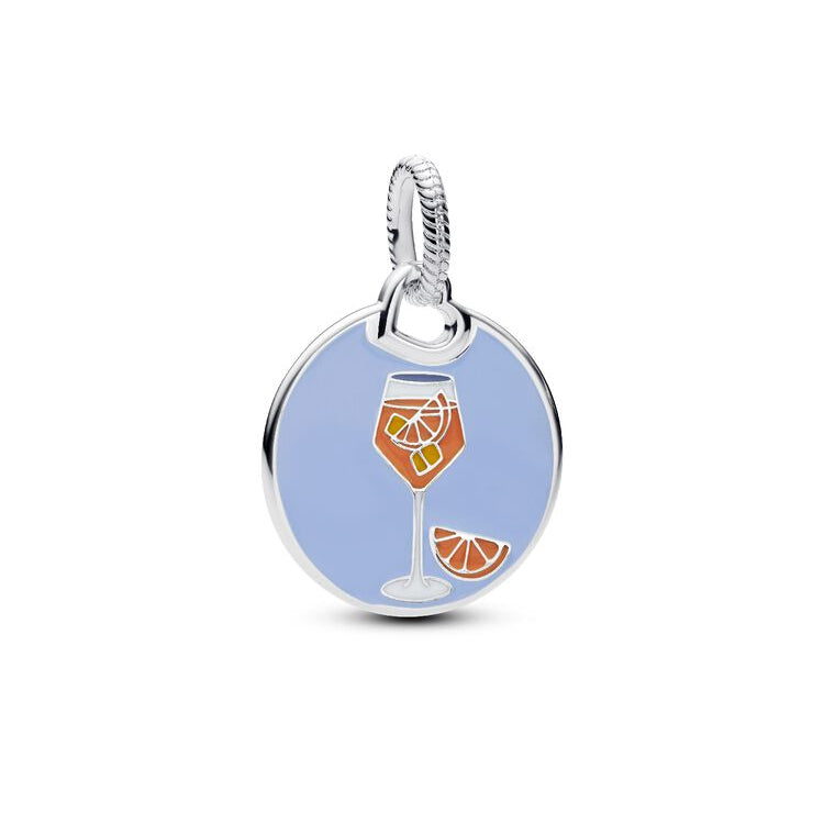 Silver charm with a design of a glass of wine and an orange on a light blue background