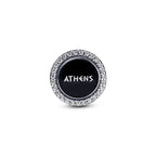 Round black disc with 'ATHENS' text and silver border on a white background