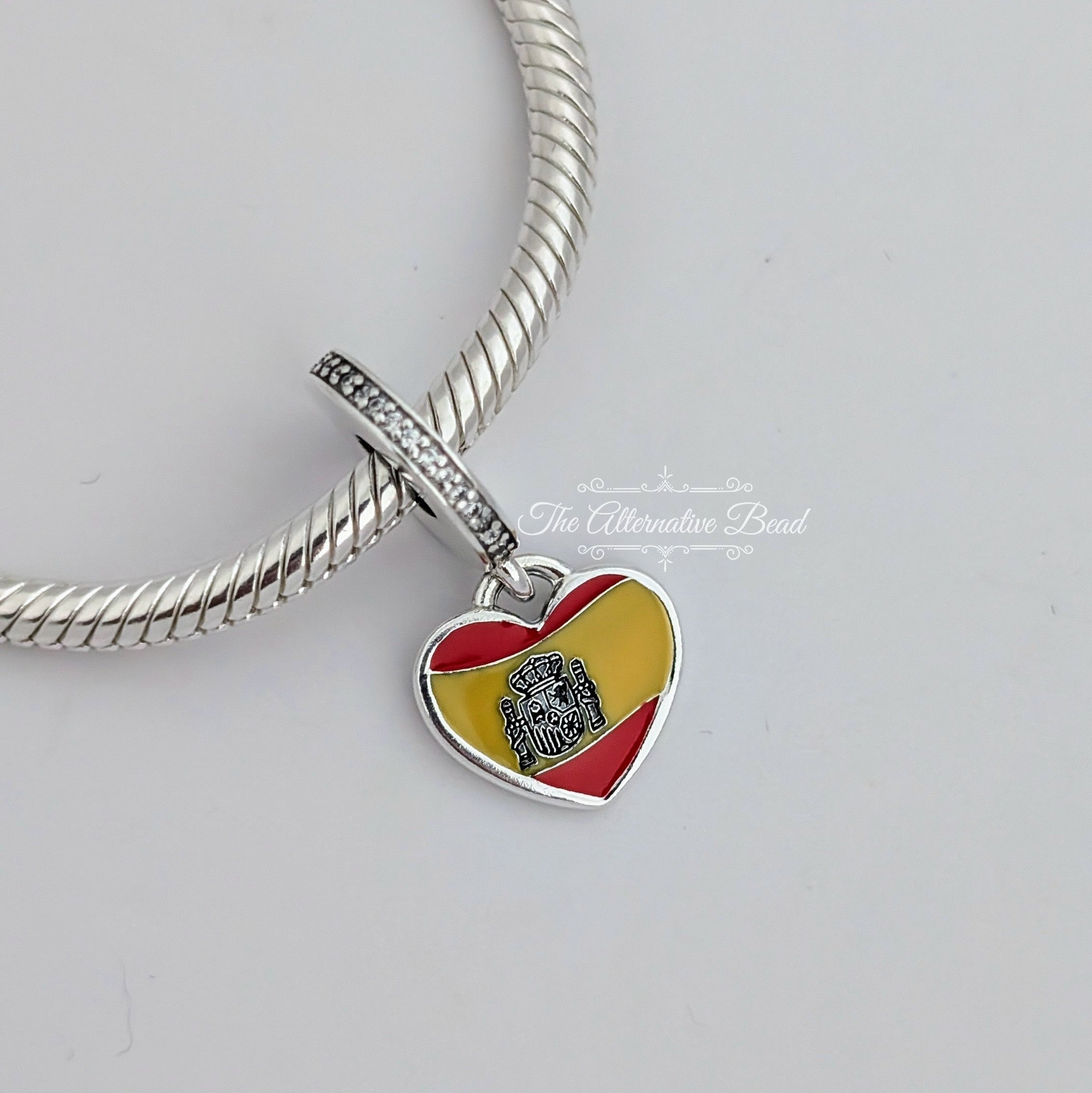 Pandora Spanish Flag Heart Dangle (792017CZ_E019) yellow and red and silver sterling-silver and enamel Dangle by The Alternative Bead. Your Jewelry Retailer from Germany