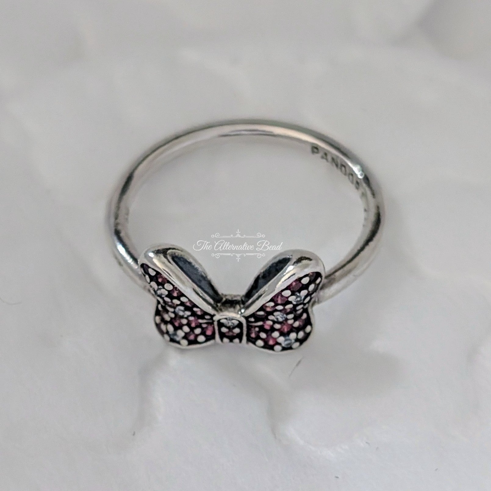 Disney x Pandora Minnie Mouse Sparkling Bow Ring (190956CZR) silver and pink sterling-silver Ring by The Alternative Bead. Your Jewelry Retailer from Germany