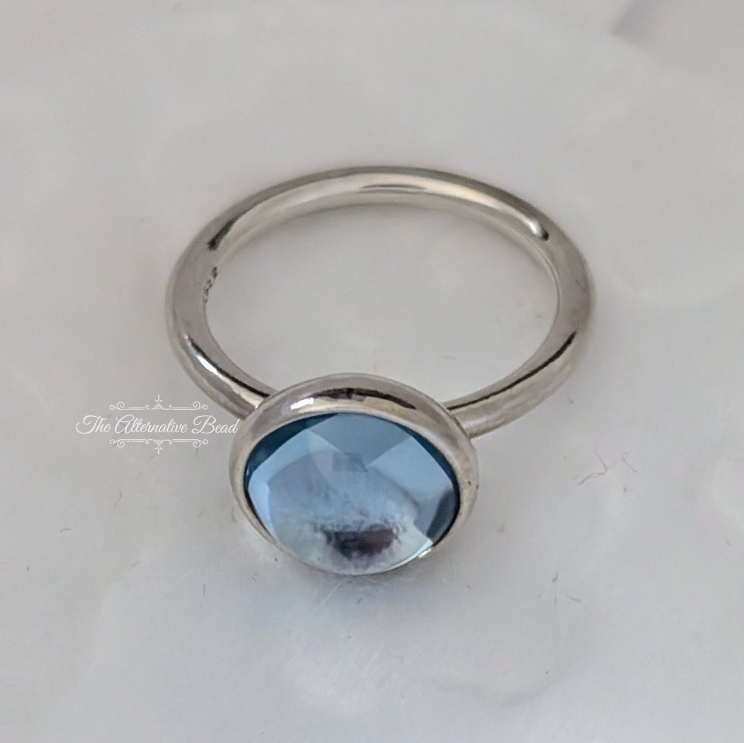 Poetic Droplet Ring with Aqua Blue Crystal