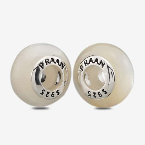 Praan Round Solid Mother-of-Pearl Stopper Charms white mother-of-pearl Stopper by The Alternative Bead. Your official Praan Retailer from Germany